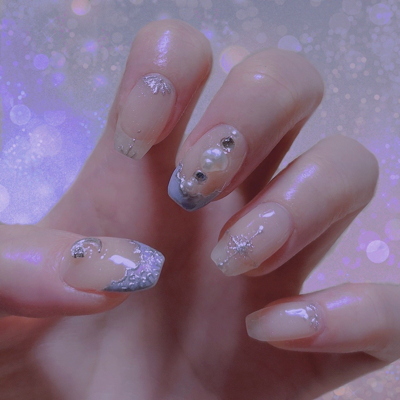 ねこ🐱 on LIPS 「夢と魔法の国がテーマのディズニーネイル🪄🩵シー仕様で水色にした..」(1枚目)