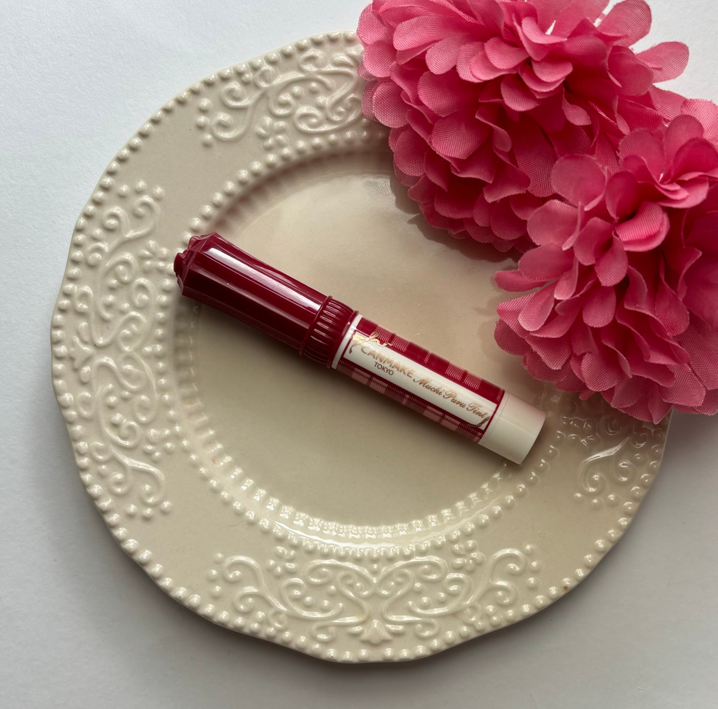 kogi. on LIPS 「キャンメイクさんのむちぷるティント03ワインベリーです。出先で..」(1枚目)