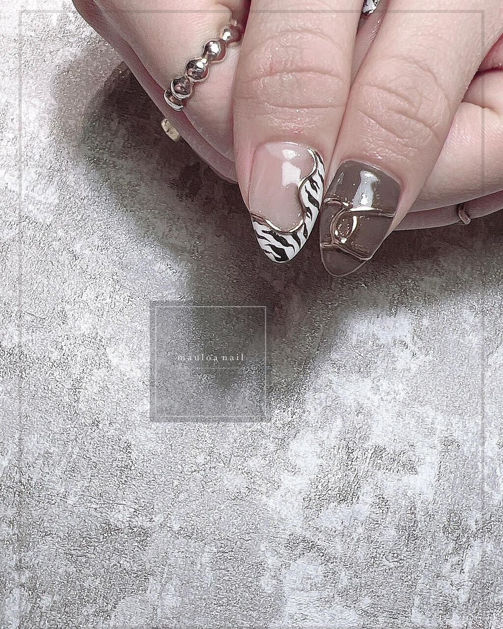 #ネイル,#月ネイル,#アートネイル,#ゼブラネイル,#ミラーアートネイル,#アニマルネイル,#夏ネイル,#ヒョウ柄ネイル,#オータムネイル,#ジュエリーネイル,#ミラーネイル,#手書きアートネイル,#スタッズネイル,#ブラウンネイル,#春ネイル,#天王寺ネイル,#牛柄ネイルのネイルデザイン