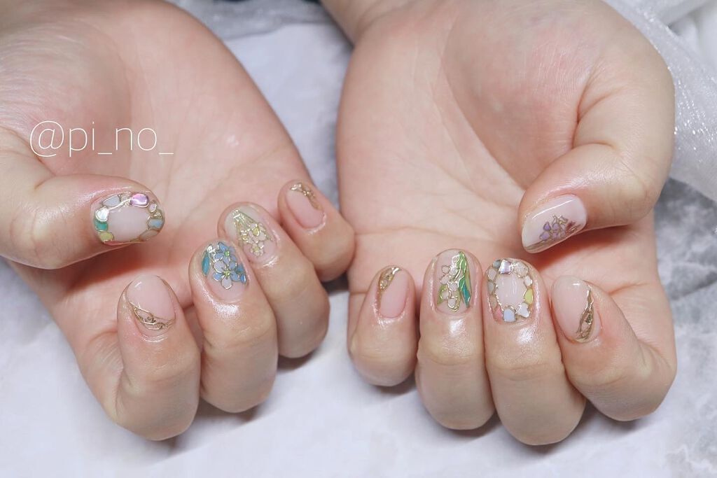 shino on LIPS 「春のお花ネイル★⏩⏩⏩#お花ネイル#すずらんネイル#flowe..」(3枚目)