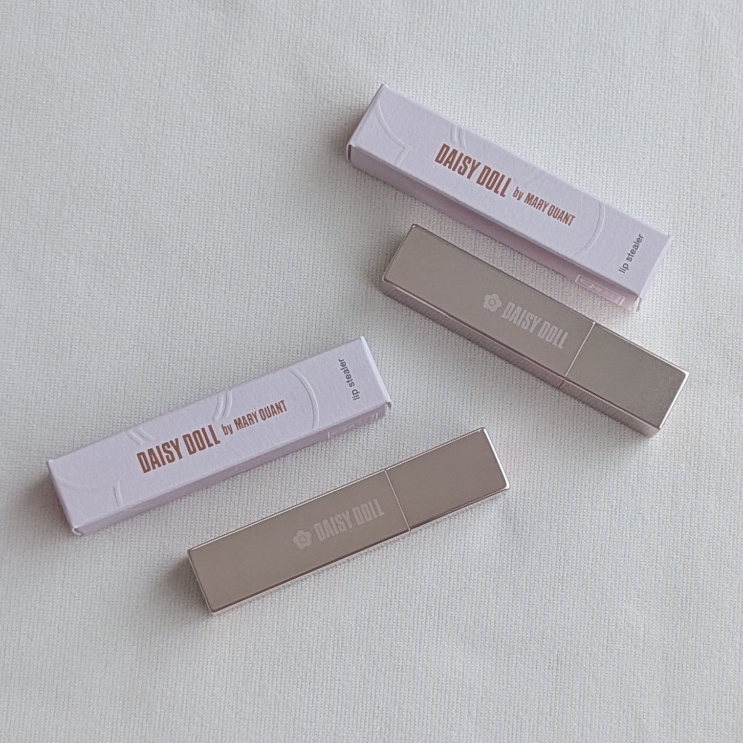 デイジードール リップ スティーラー　 04 夢を叶えるトパーズ/DAISY DOLL by MARY QUANT/口紅を使ったクチコミ（2枚目）