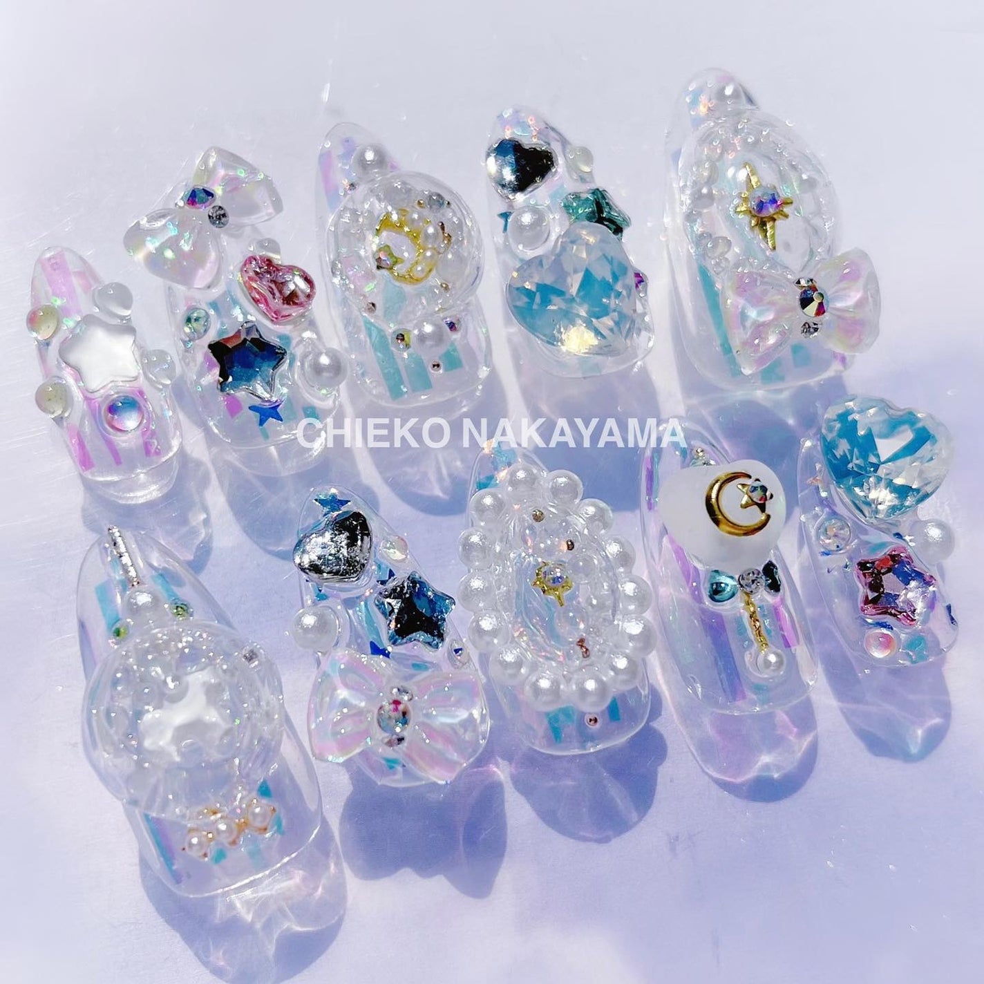 なかやまちえこ on LIPS 「魔法少女のおもちゃ箱ネイル🪄⠀⠀@nailvenus_maga..」(2枚目)