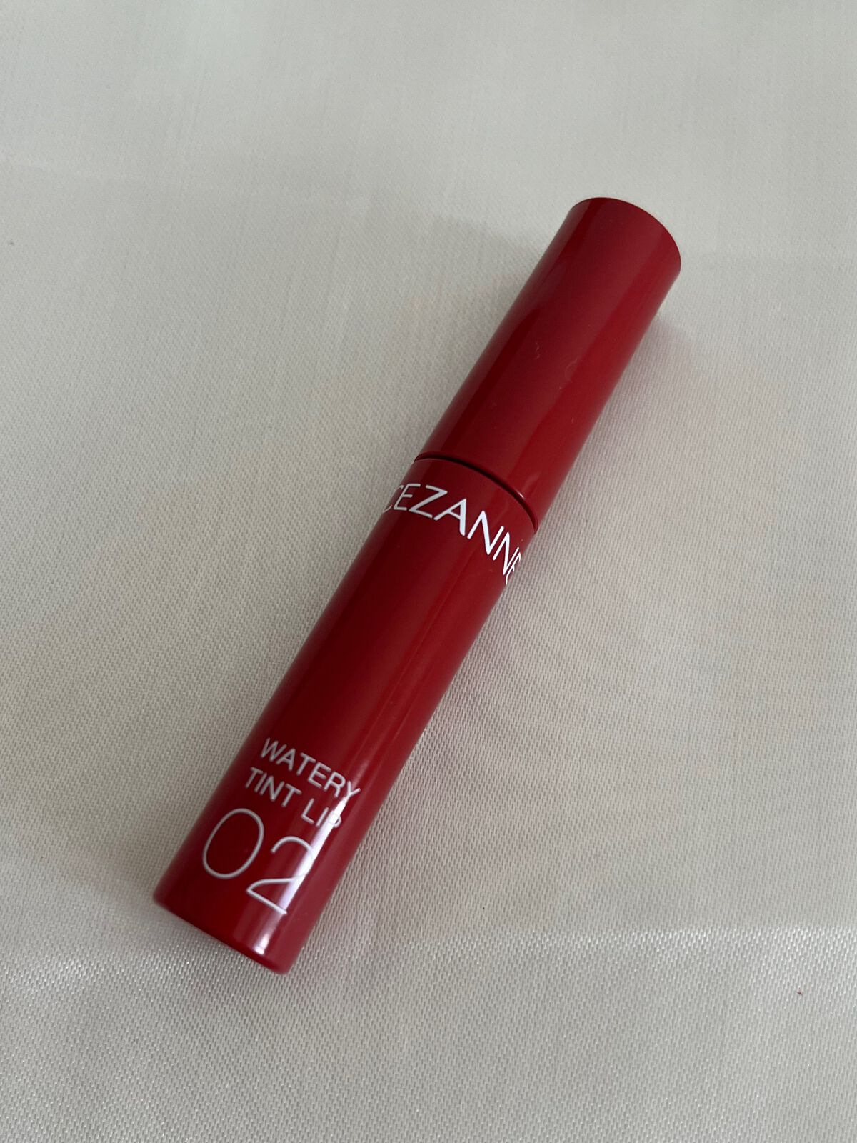 ウォータリーティントリップ 02 コーラルレッド/CEZANNE/リップティントを使ったクチコミ（3枚目）