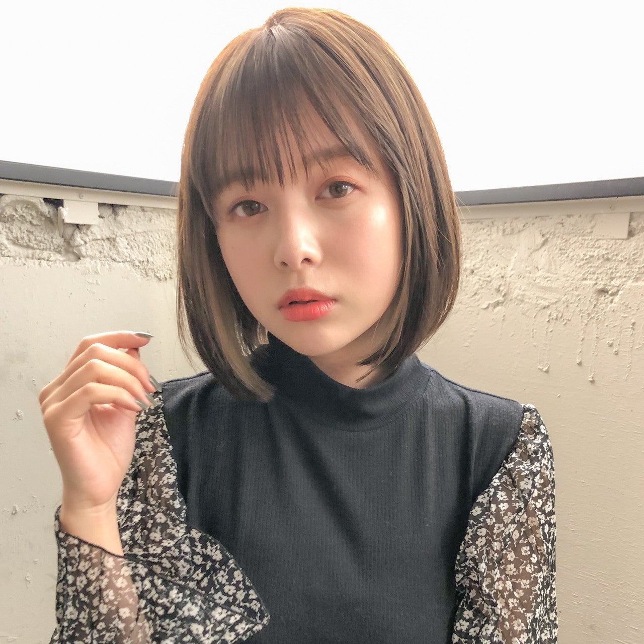 前下がりボブの女性