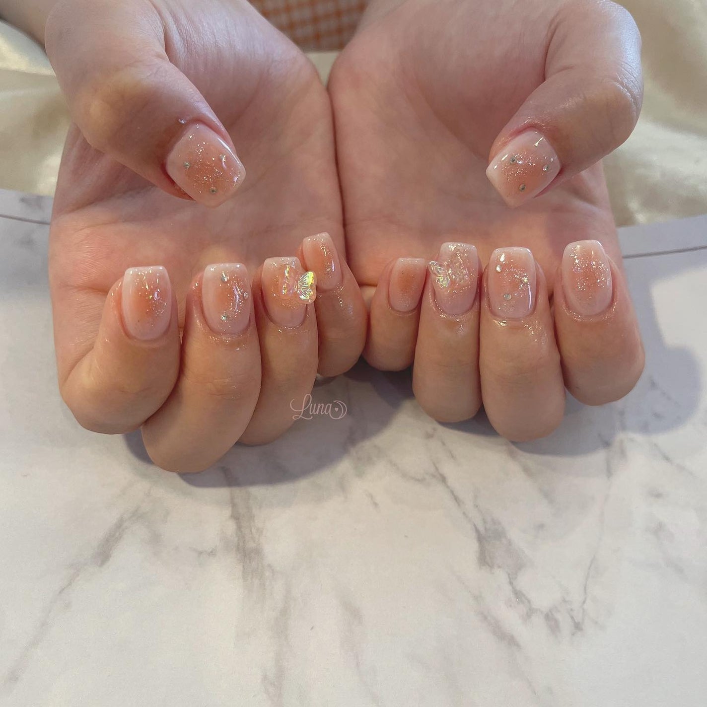 Iuna. Mizuki on LIPS 「.cheek🧡#nail#nailstagram#gelnai..」(2枚目)