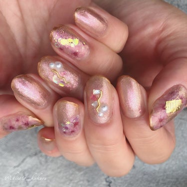 .‎˖٭Polish Nail .‎˖٭
・
ちふれの新色102を使用したネイル☻
ピンク系ラメの102番は公式ではシルバーラメとピンクラメが光で変化するとなってるけどパッと見ゴールドにも見えるしとても魅惑的なカラーですごく綺麗です！
角度や光の加減によって見え方が変わるのが可愛い♥
＊
＊
＊
#ネイル#セルフネイル#マニキュア#ポリッシュ#春ネイル#ちふれの画像 その0