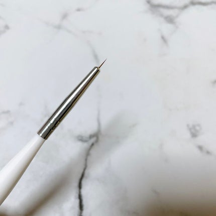 DAISO ネイルブラシ(ライン)のクチコミ「DAISO
ネイルブラシ
これもね、、、
ネイル初心者だからなのか
すごく使いづらくて
全く.....」(2枚目)