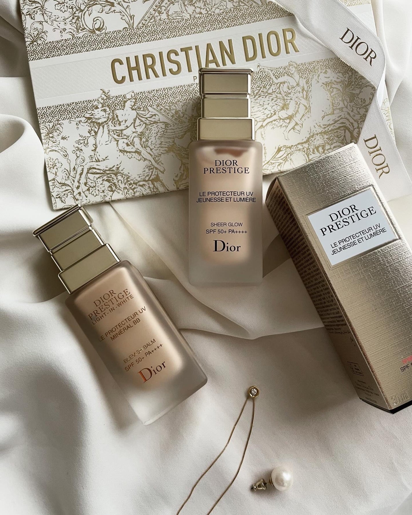 Dior UVルミエールシアーグロー&ノベルティー ポーチ&ストラップチャーム プレステージ ホワイト ル プロテクター UV ルミエール