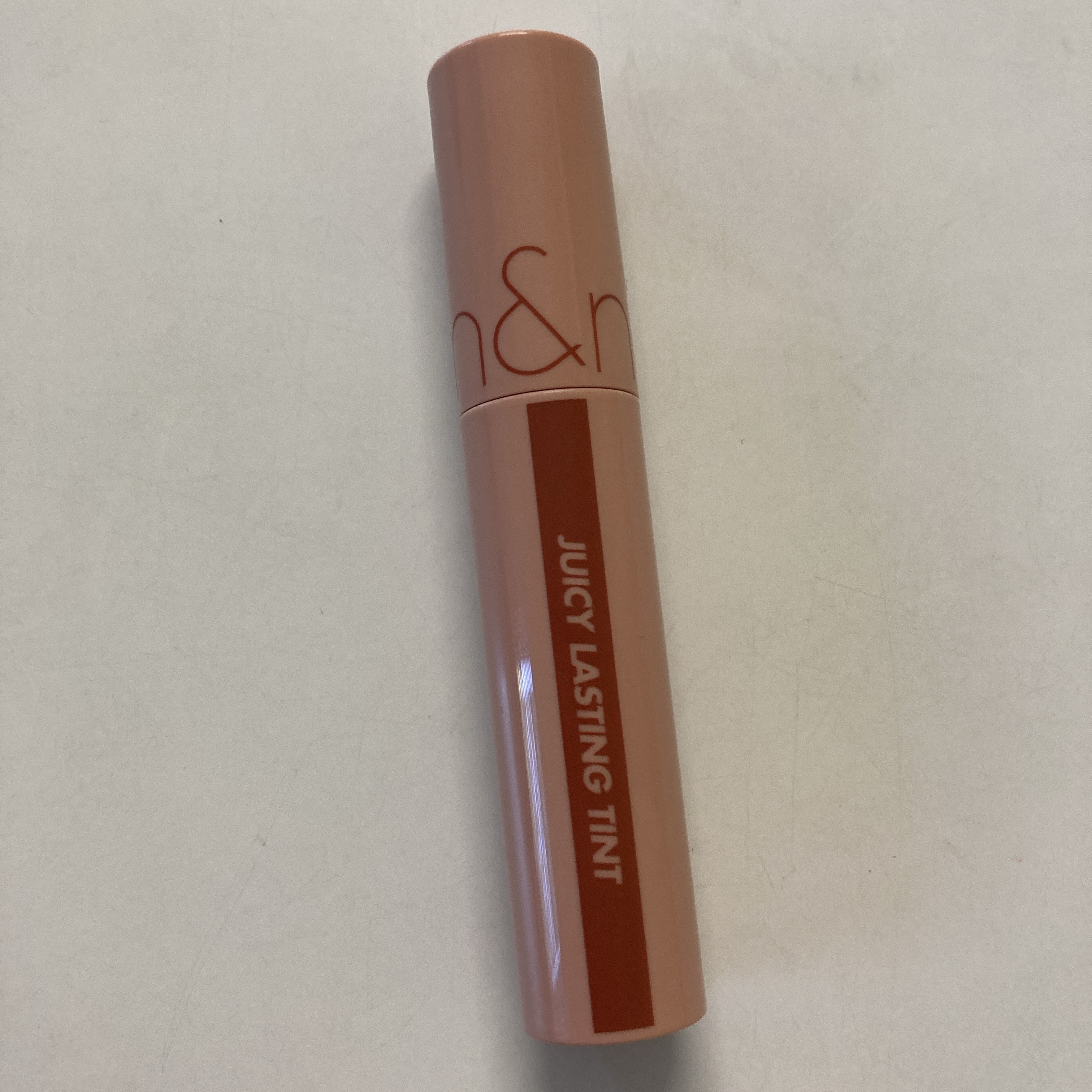 ジューシーラスティングティント 23 ヌカダミア(NUCADAMIA)/rom&nd/リップティントを使ったクチコミ（1枚目）