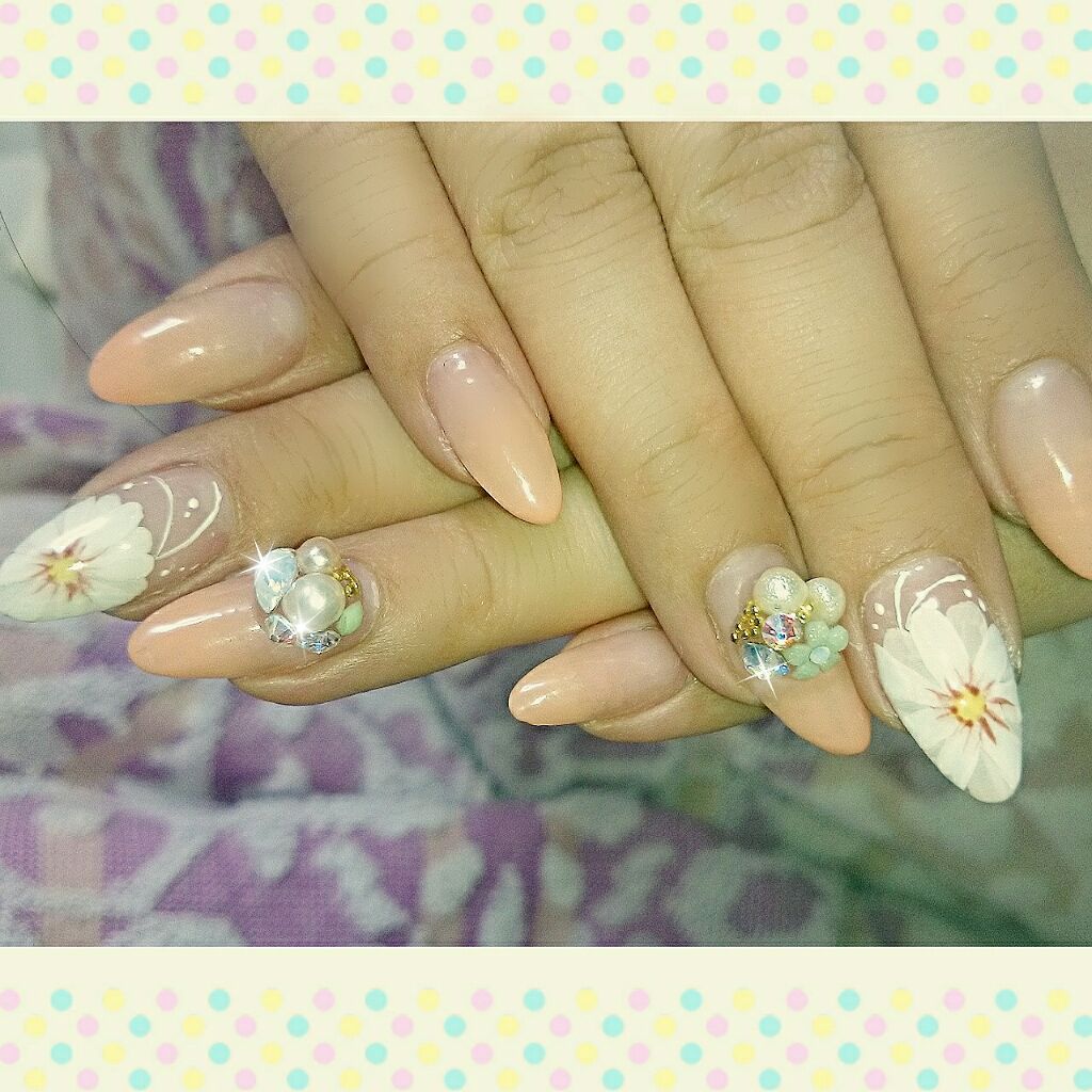 りんごプロレス on LIPS 「グラデーションネイル×お花透け感のあるオレンジのグラデーション..」(1枚目)