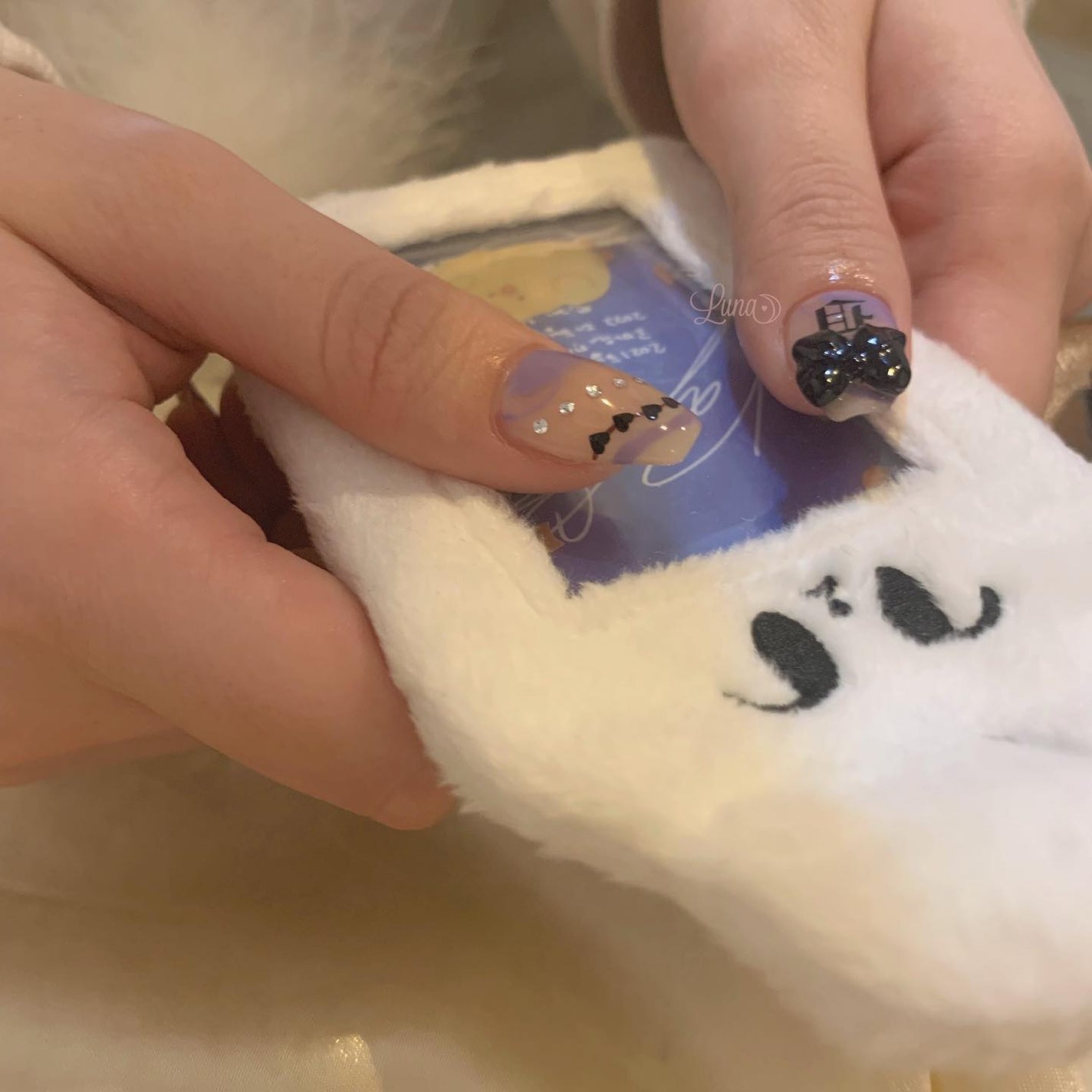Iuna. Mizuki on LIPS 「.💜🖤#nail#nailstagram#gelnail#ジ..」(3枚目)