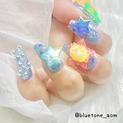 ⋆͛🦖⋆͛aomi on LIPS 「ゴテゴテネイル2つ目!今回はブルーをベースにコダックコダちゃん..」(5枚目)