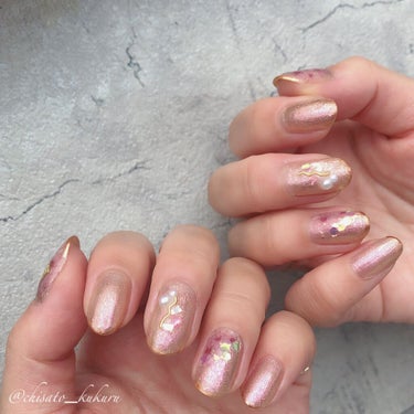 .‎˖٭Polish Nail .‎˖٭
・
ちふれの新色102を使用したネイル☻
ピンク系ラメの102番は公式ではシルバーラメとピンクラメが光で変化するとなってるけどパッと見ゴールドにも見えるしとても魅惑的なカラーですごく綺麗です！
角度や光の加減によって見え方が変わるのが可愛い♥
＊
＊
＊
#ネイル#セルフネイル#マニキュア#ポリッシュ#春ネイル#ちふれの画像 その1