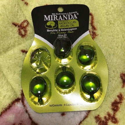 MIRANDA ヘアビタミン ニュートリヘアオイルのクチコミ「*ミランダ ニュートリヘアオイル緑(潤いある髪へ)
ピンクも買ったけど先にこっち。
・いい.....」(1枚目)