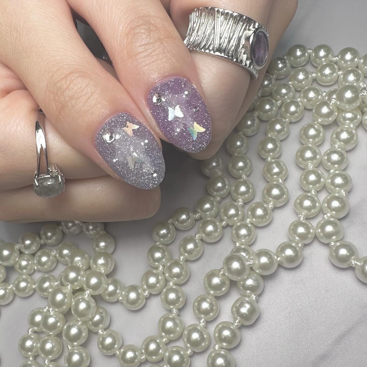 kanna on LIPS 「・・・💙💜📷💍✨✨ブルー×パープルのフラッシュネイルでフレンチ..」(3枚目)