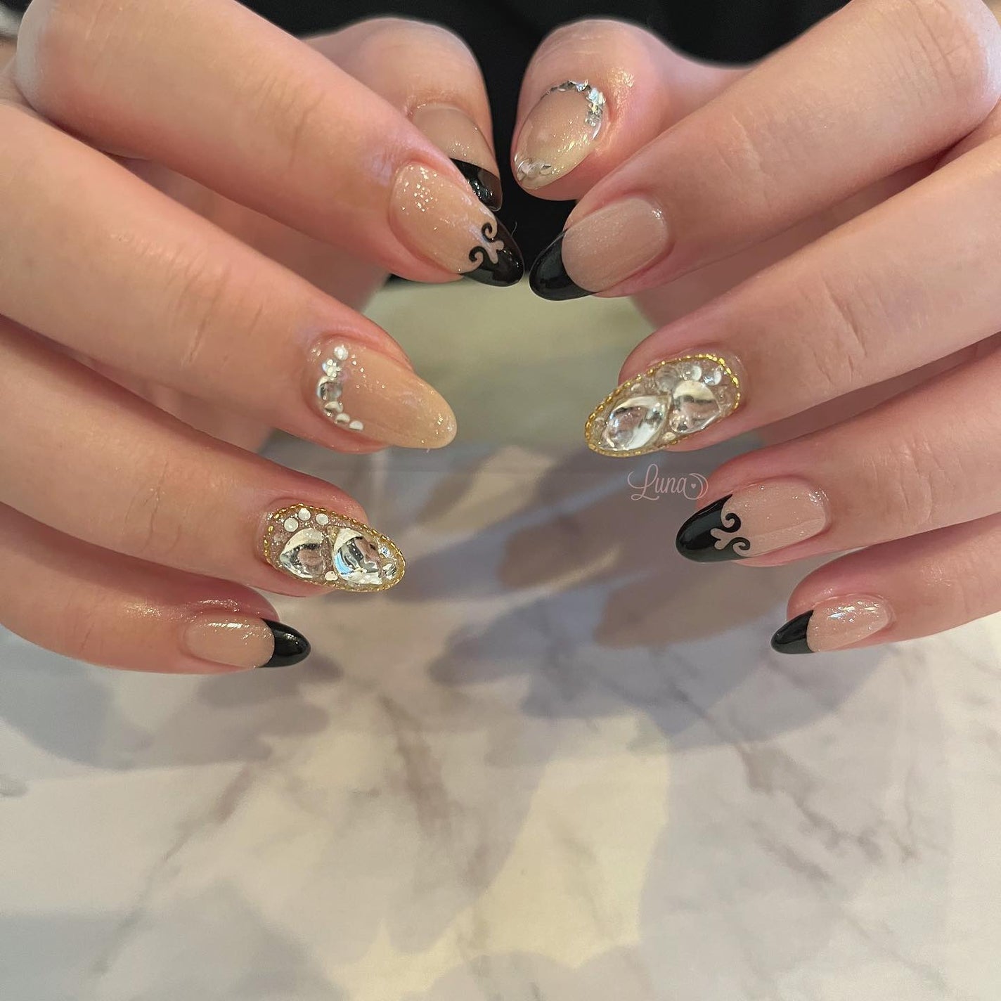 Iuna. Mizuki on LIPS 「.スペシャルプラン🖤#nail#nailstagram#gel..」(2枚目)