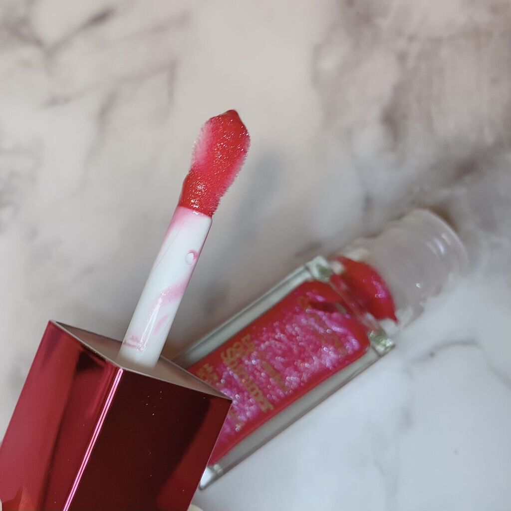 コンフォート リップオイル シマー 05 プリティインピンク(限定)/CLARINS/リップグロスを使ったクチコミ（2枚目）