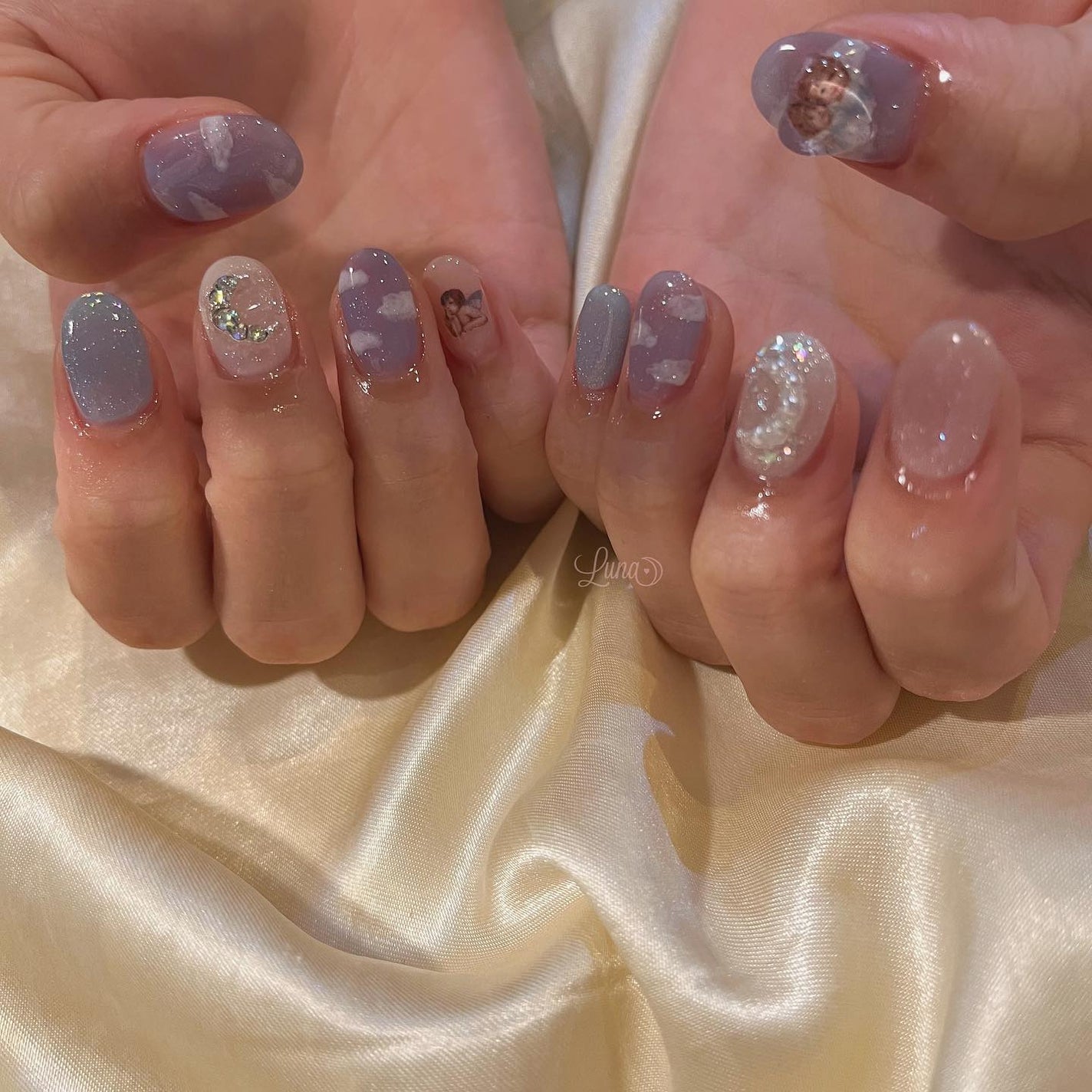 Iuna. Mizuki on LIPS 「.👼🏻#nail#nailstagram#gelnail#ジ..」(2枚目)