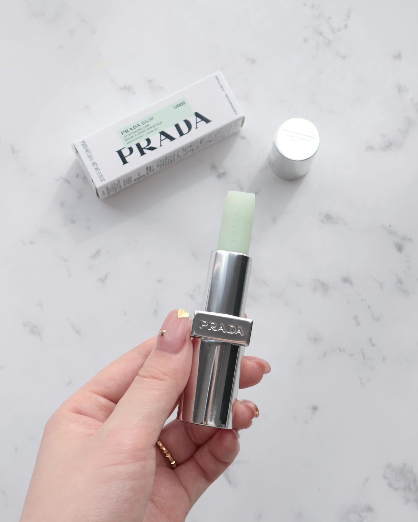 濱田あおい on LIPS 「🕊️🖤giftとしても人気が高まりそうなPRADAのlipba..」(1枚目)