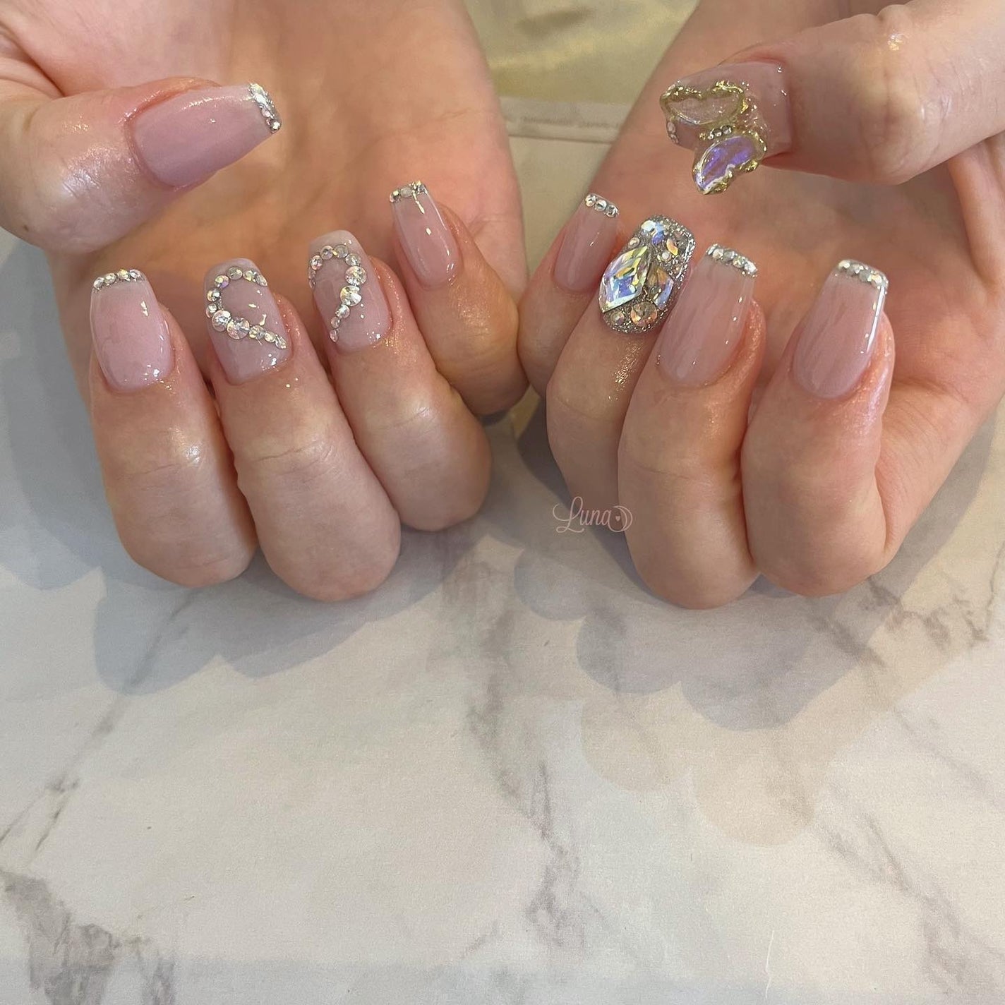 Iuna. Mizuki on LIPS 「.お揃いにしてくださいました🤍#nail#nailstagra..」(2枚目)