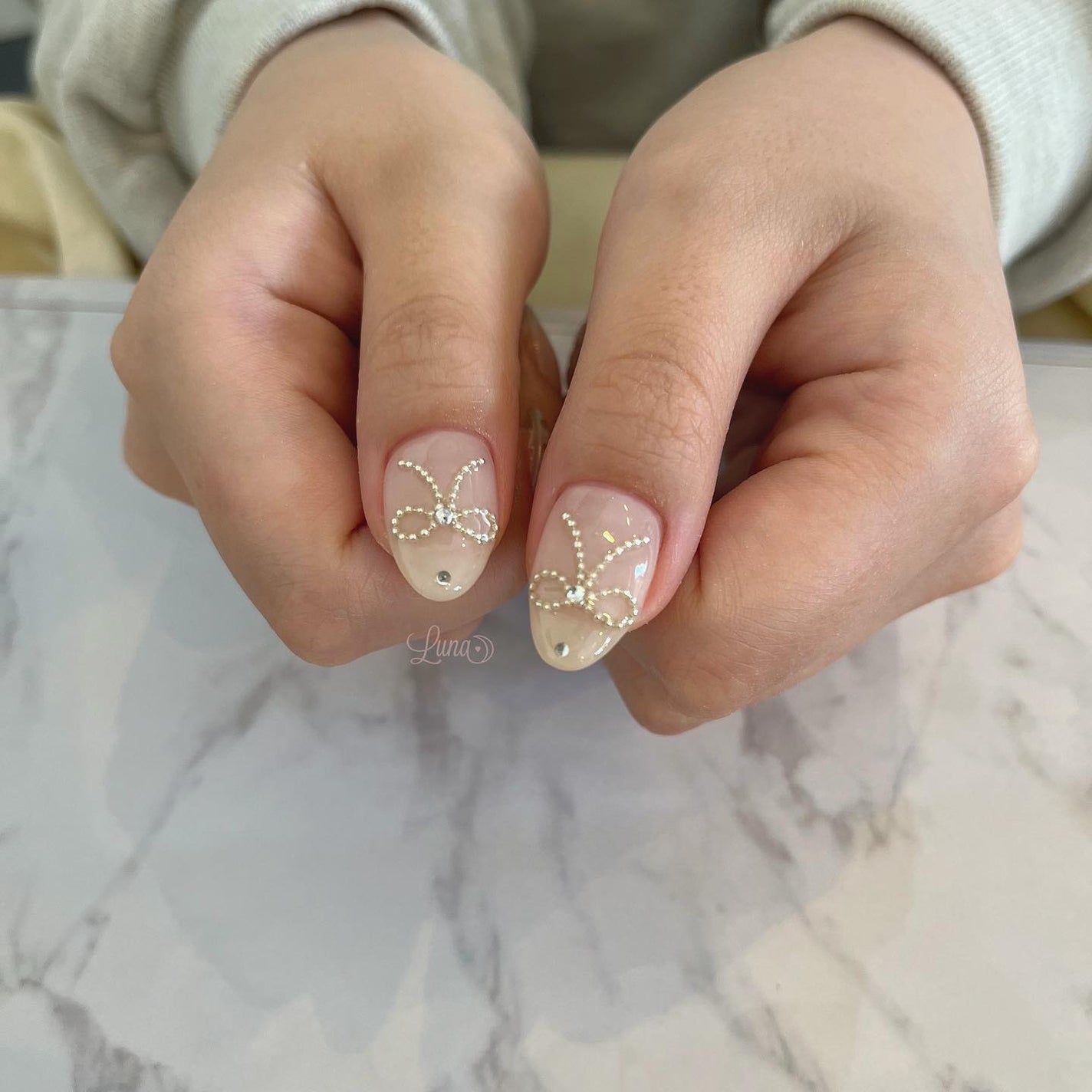 Iuna. Mizuki on LIPS 「.スペシャルプラン🎀🤍#nail#nailstagram#ge..」(2枚目)