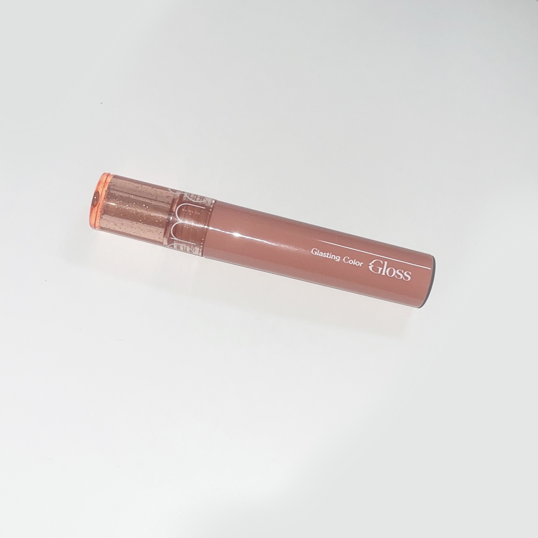 グラスティングカラーグロス 09 PEACH SPARKLE (ピーチスパークル)/rom&nd/リップグロスを使ったクチコミ（1枚目）