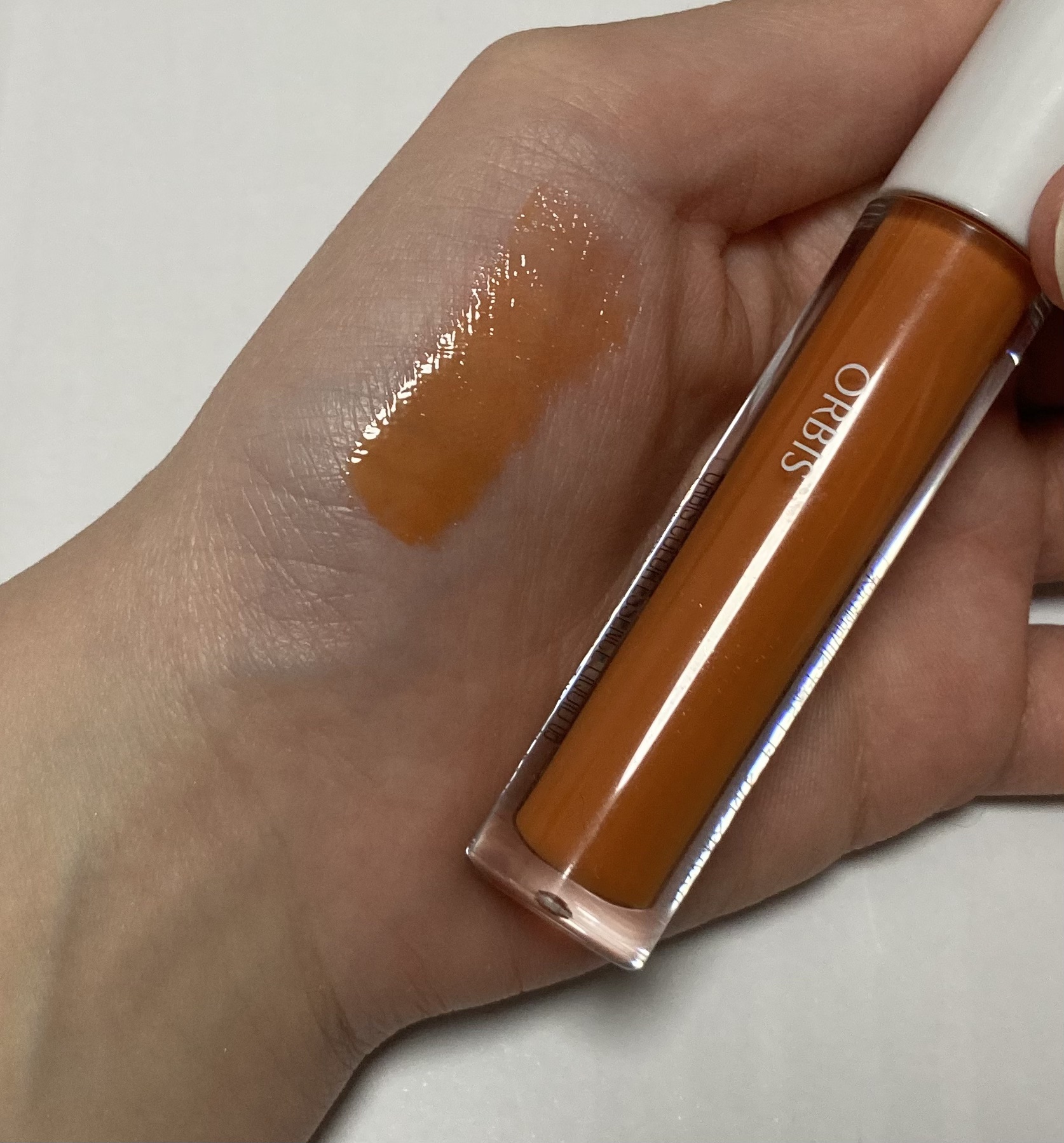 オルビス カラーエッセンスリキッドのクチコミ「オルビスのカラーエッセンスリキッド、サンセットオレンジを購入しました。

冬にピッタリなうるう.....」（2枚目）