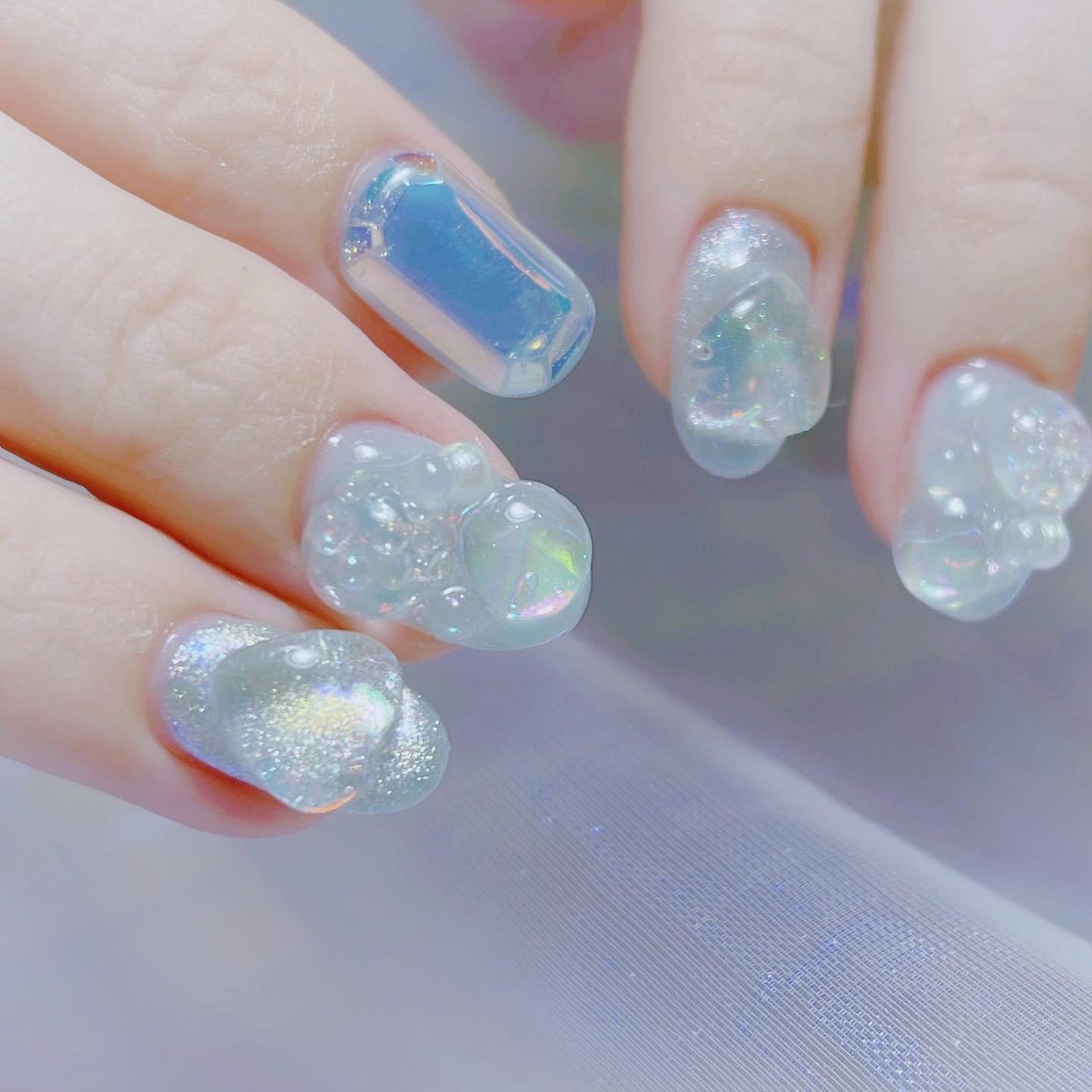 なかやまちえこ on LIPS 「とぅるっと水色ネイル☁️⠀⠀@sarikin0⠀⠀代官山にてシ..」(3枚目)