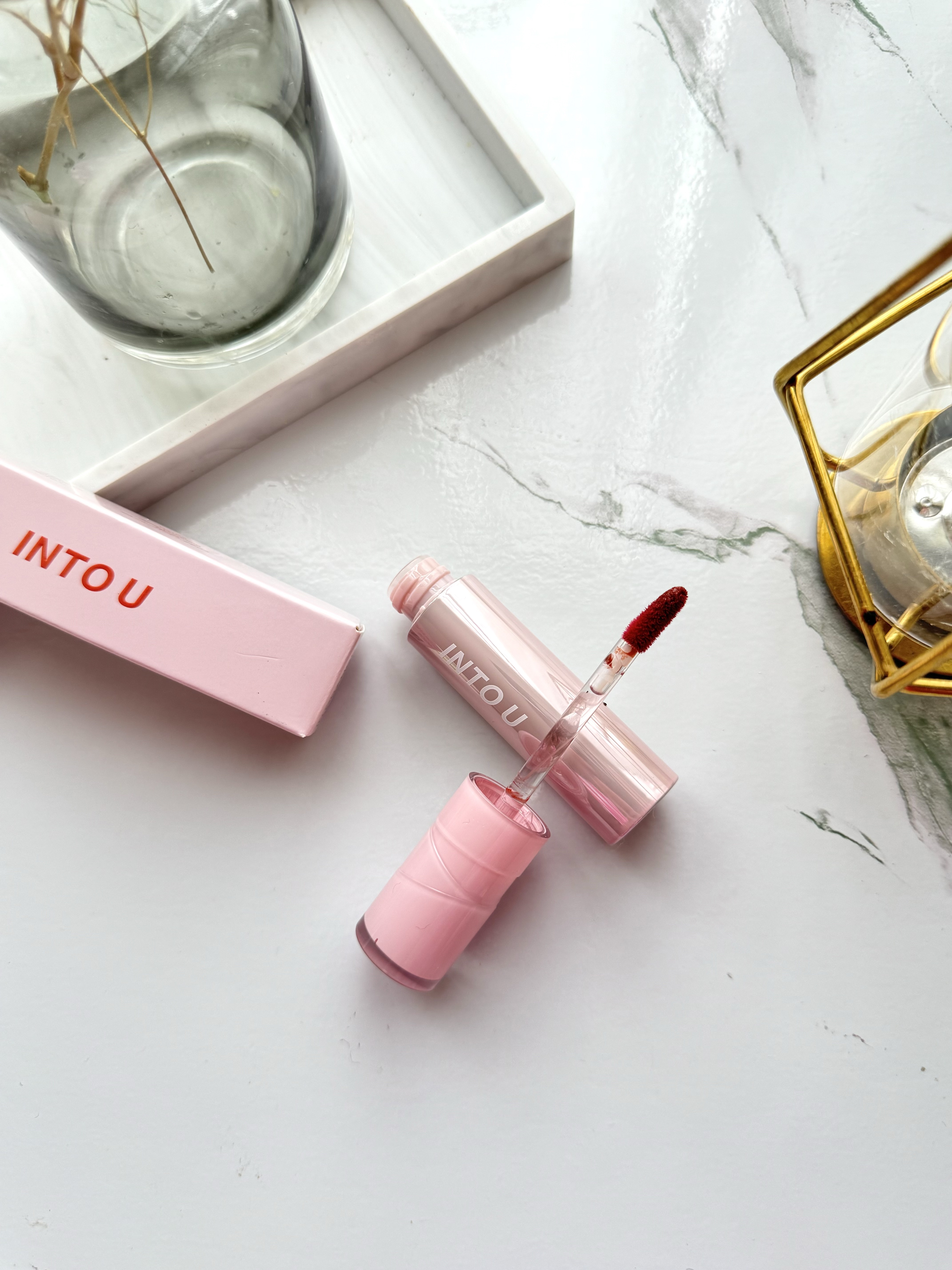 ジューシーパンピンググロス/INTO U/リップグロスを使ったクチコミ（2枚目）