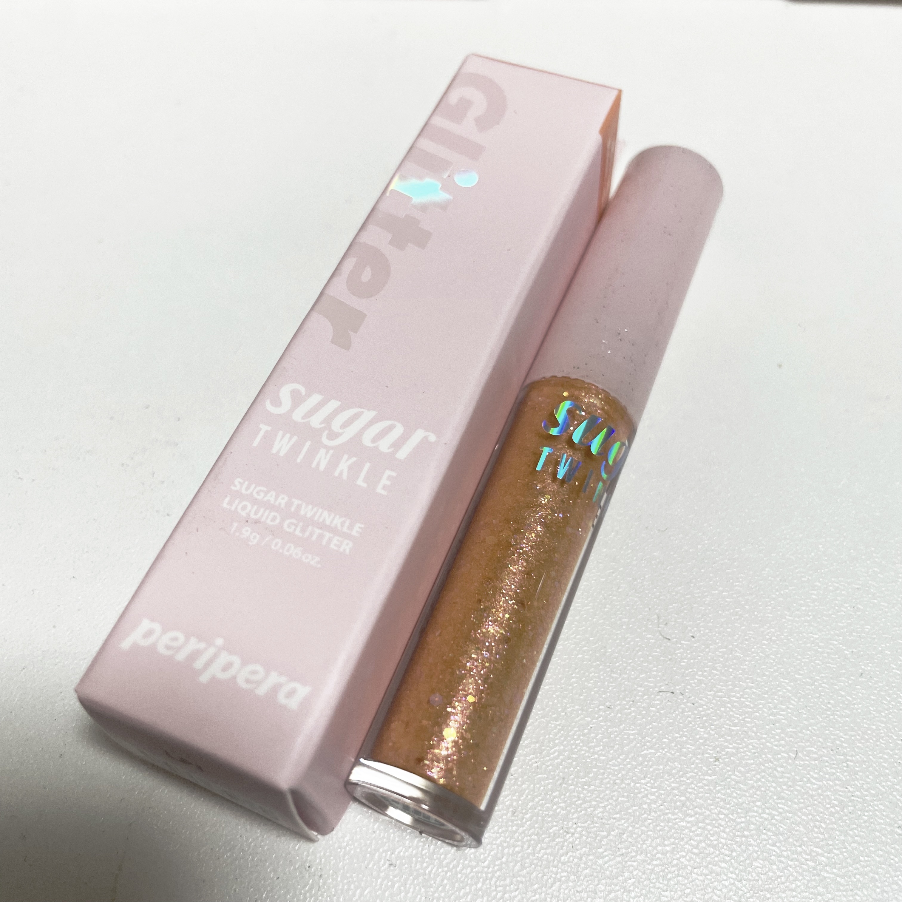 シュガー トゥインクル リキッド グリッター 03 BEAMING SUNNY-LIGHT/PERIPERA/グリッターを使ったクチコミ（1枚目）