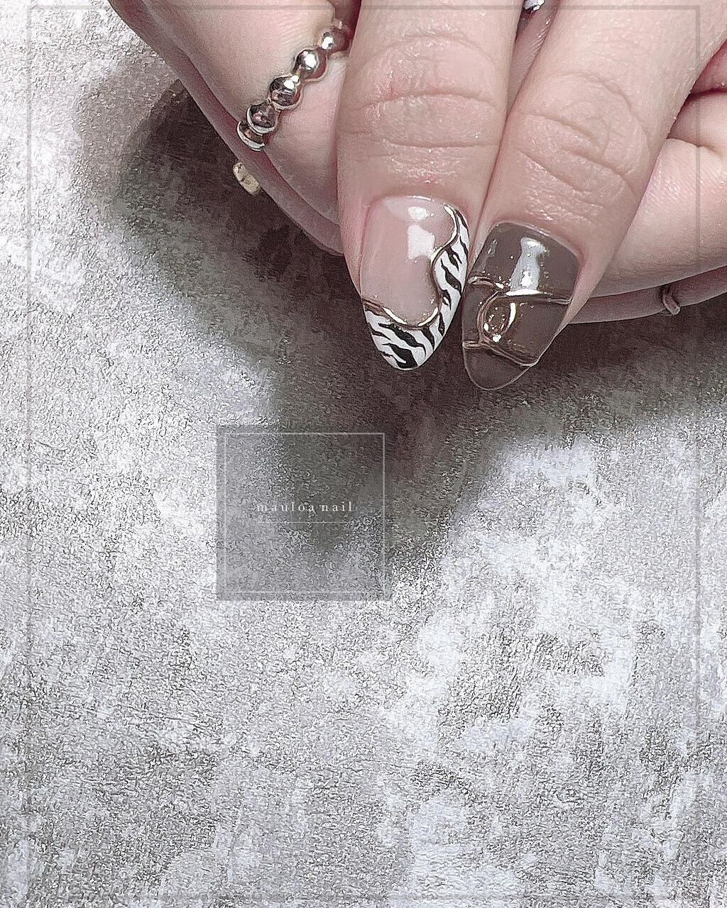 #ネイル,#月ネイル,#アートネイル,#ゼブラネイル,#ミラーアートネイル,#アニマルネイル,#夏ネイル,#ヒョウ柄ネイル,#オータムネイル,#ジュエリーネイル,#ミラーネイル,#手書きアートネイル,#スタッズネイル,#ブラウンネイル,#冬ネイル,#天王寺ネイル,#牛柄ネイルのネイルデザイン