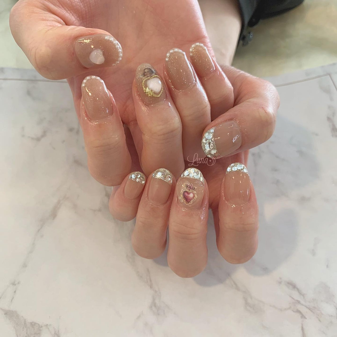 Iuna. Mizuki on LIPS 「.片手は私とおそろいにしてくださいました👼🏻🤍#nail#na..」(1枚目)