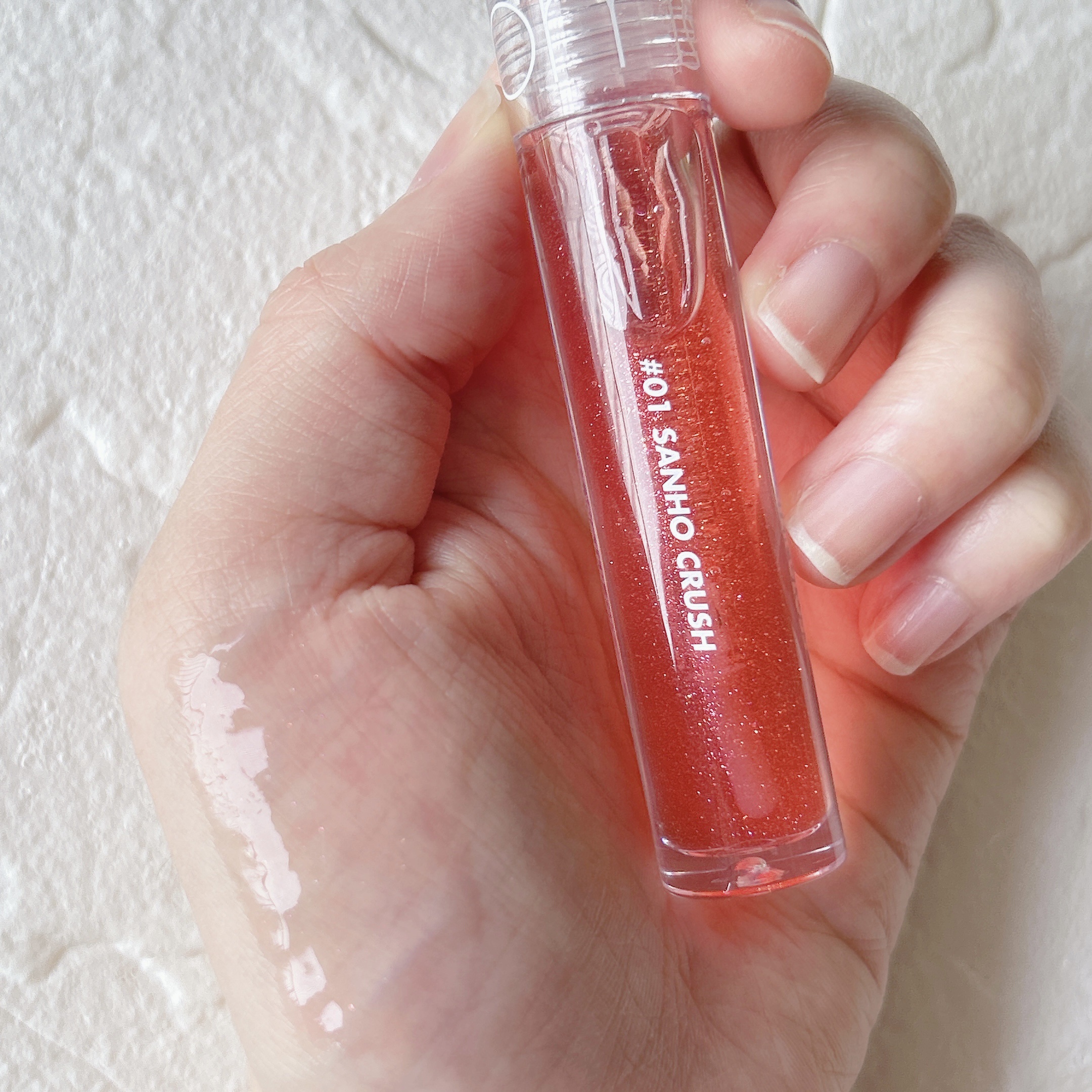 グラスティングウォーターグロス 01 サンゴ・クラッシュ/rom&nd/リップグロスを使ったクチコミ（2枚目）