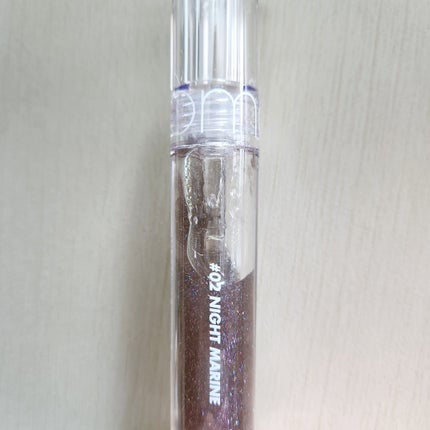 グラスティングウォーターグロス 02 ナイト・マリン/rom&nd/リップグロスの画像