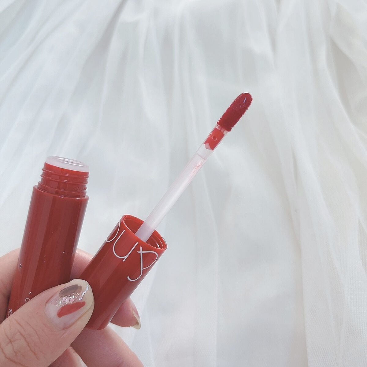 ジューシーラスティングティント/rom&nd/リップティントを使ったクチコミ（2枚目）