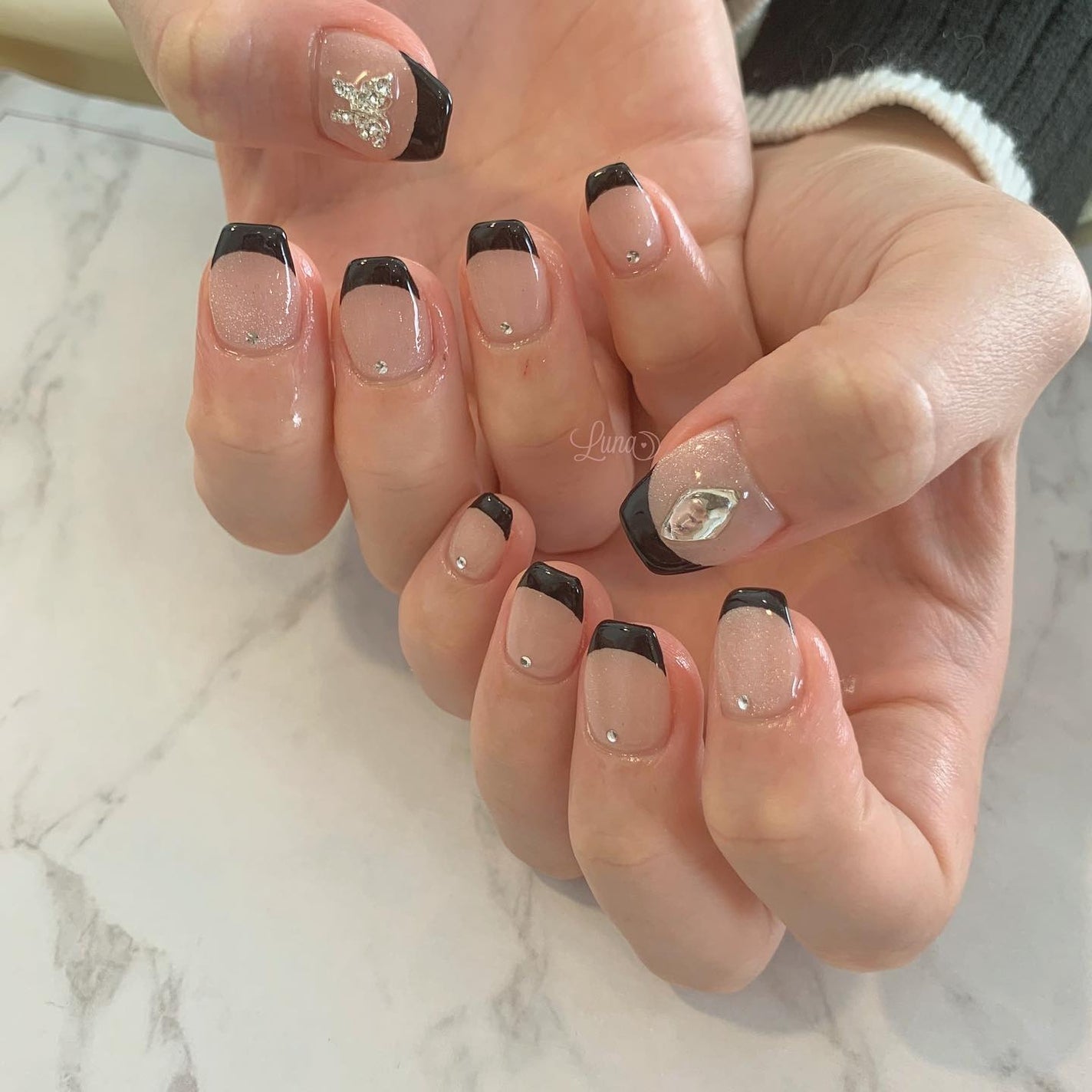Iuna. Mizuki on LIPS 「.pinkmagnetに黒フレンチ🖤#nail#nailsta..」(1枚目)