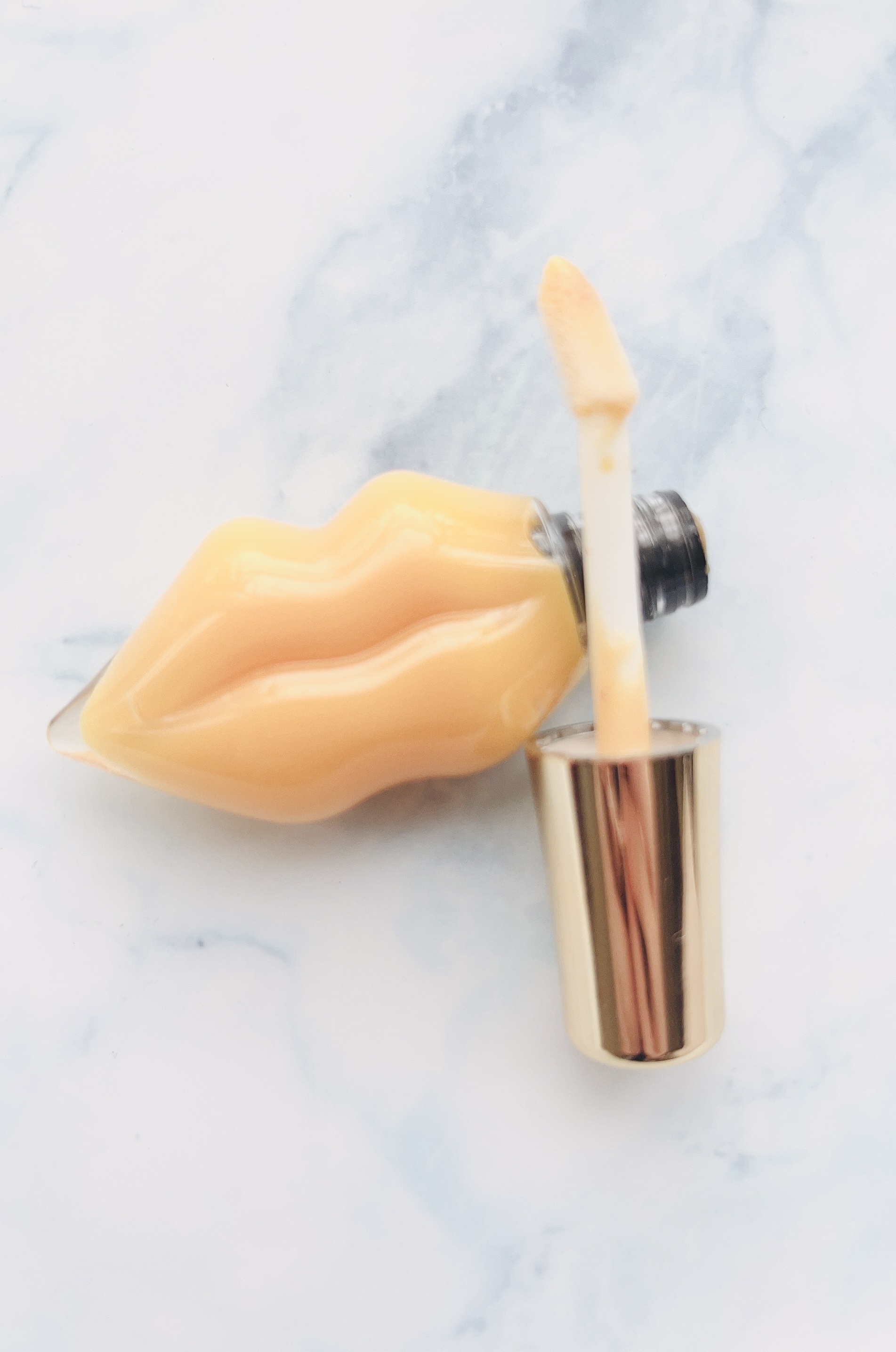 メルティーリップ グロス 127 パッションガール/プランプピンク/リップケアを使ったクチコミ（2枚目）