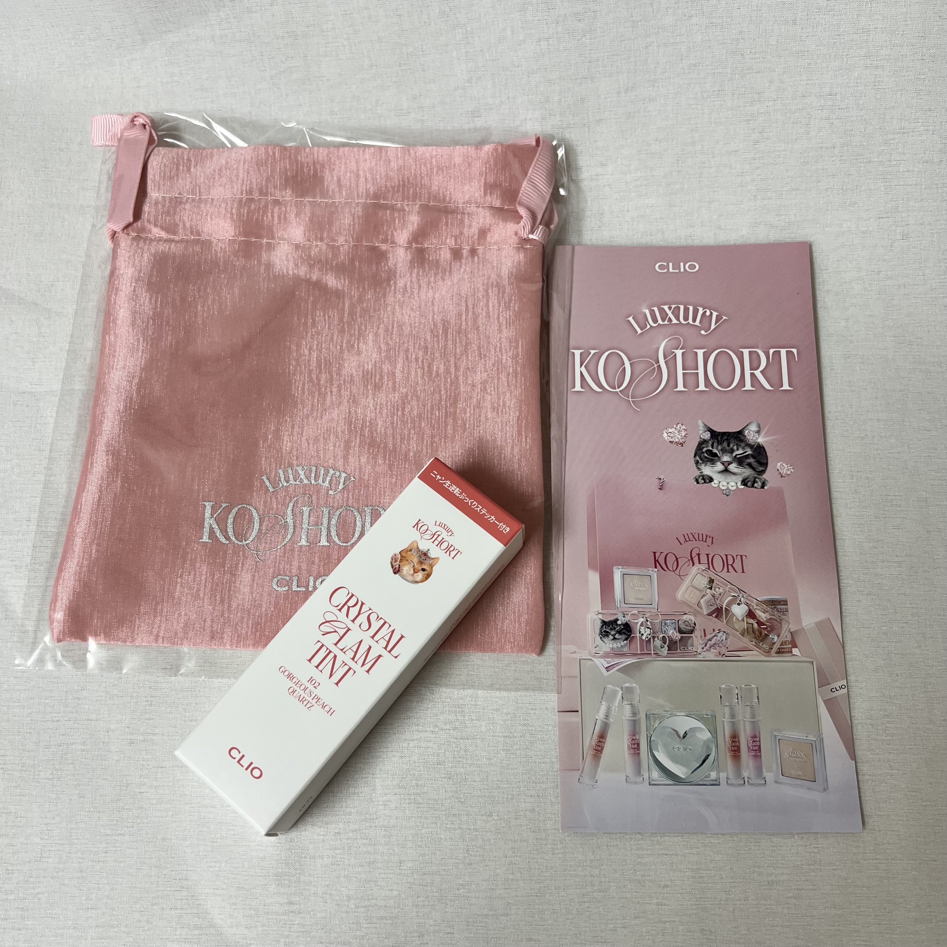 クリスタル グラム ティント 102 ゴージャスピーチクォーツ(GORGEOUS PEACH QUARTZ)/CLIO/リップティントを使ったクチコミ（2枚目）