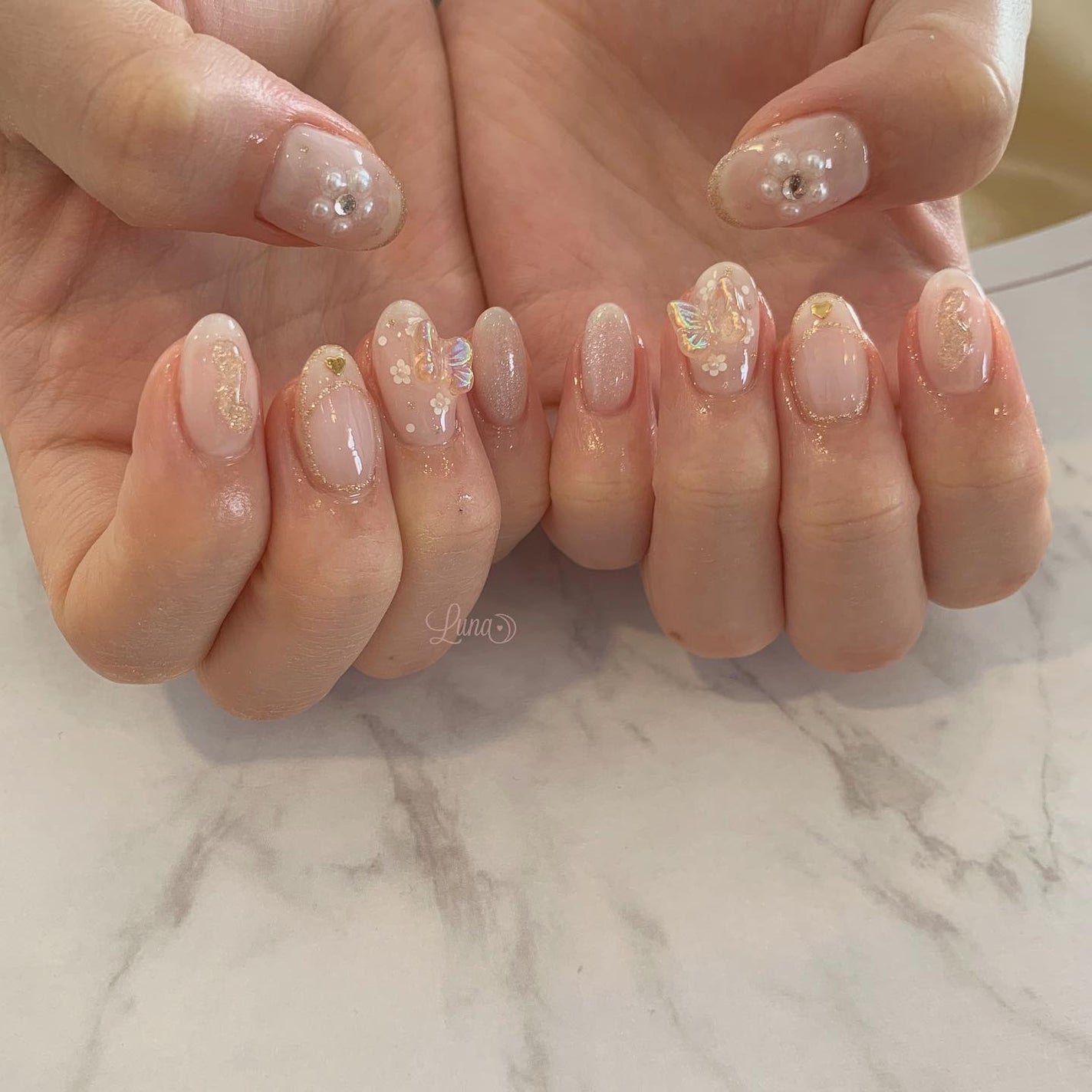 Iuna. Mizuki on LIPS 「.振袖に合わせておまかせデザイン💐#nail#nailstag..」(1枚目)