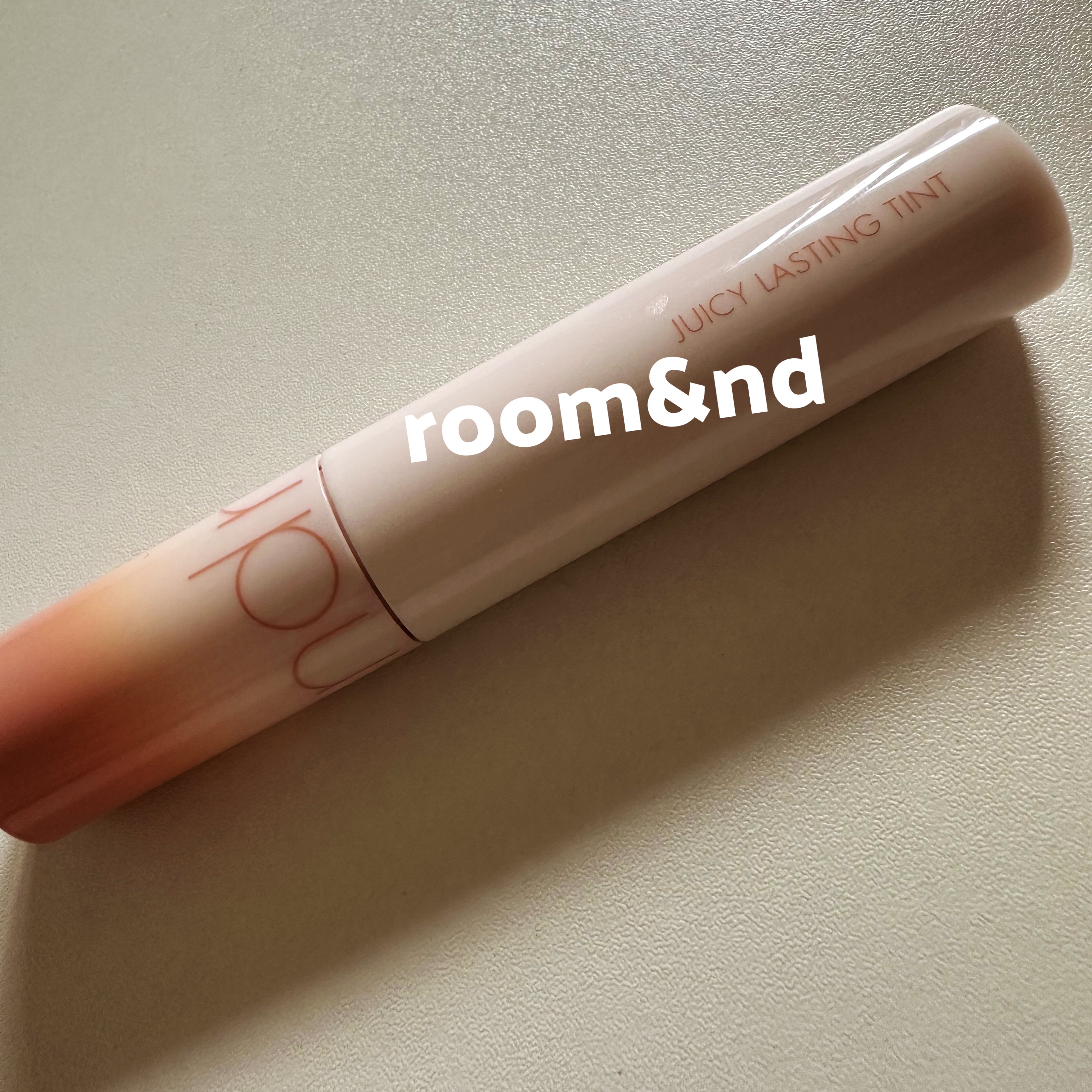 ジューシーラスティングティント 34 ベアタンジェリン(BARE TANGERINE)/rom&nd/リップティントを使ったクチコミ（1枚目）