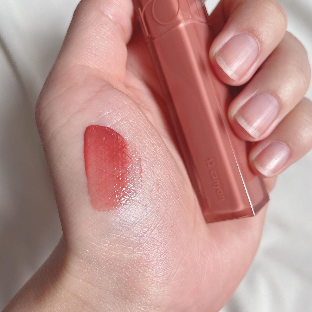 ジューシーラスティングティント/rom&nd/リップティントを使ったクチコミ（2枚目）