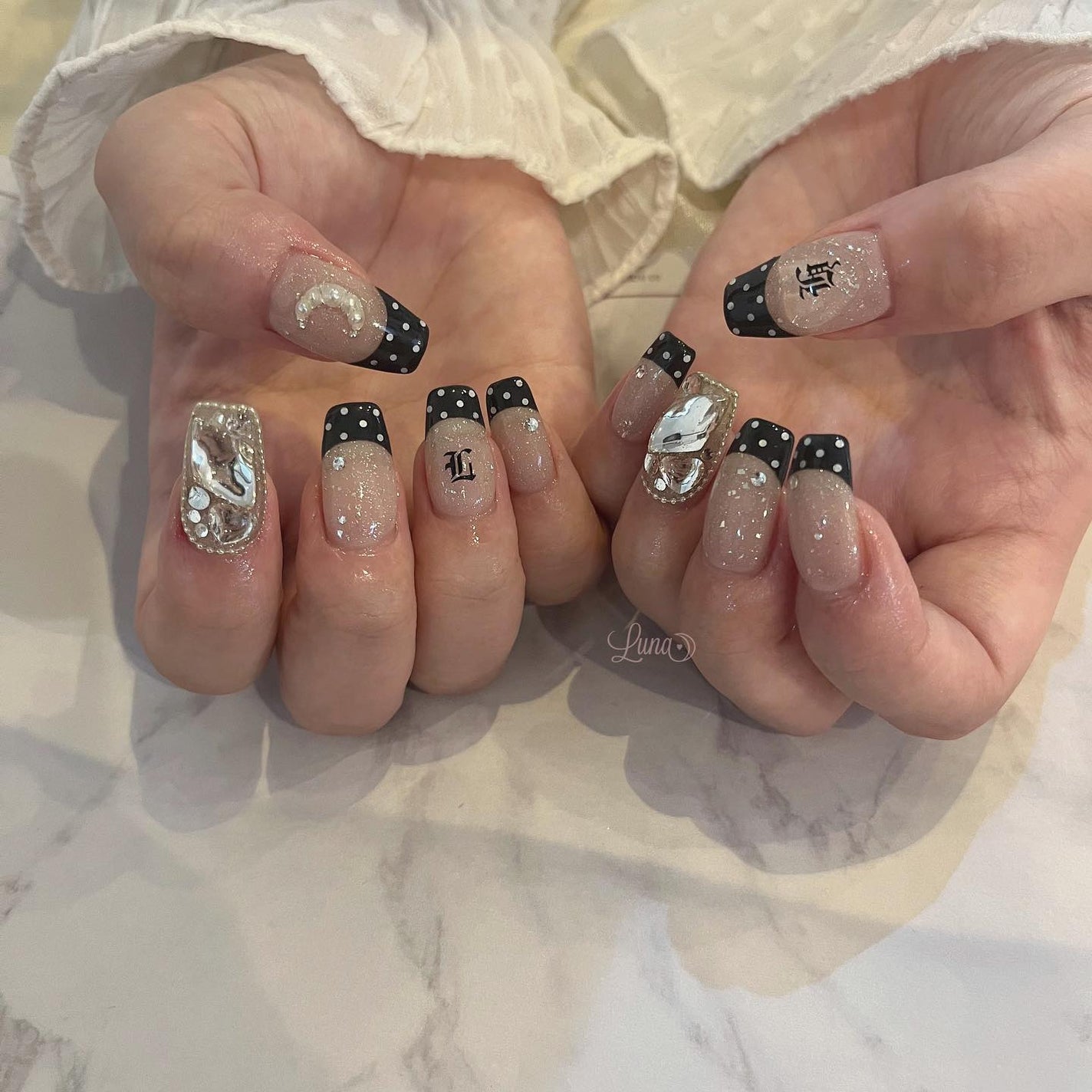 Iuna. Mizuki on LIPS 「.スペシャルプラン🖤🤍#nail#nailstagram#ge..」(1枚目)