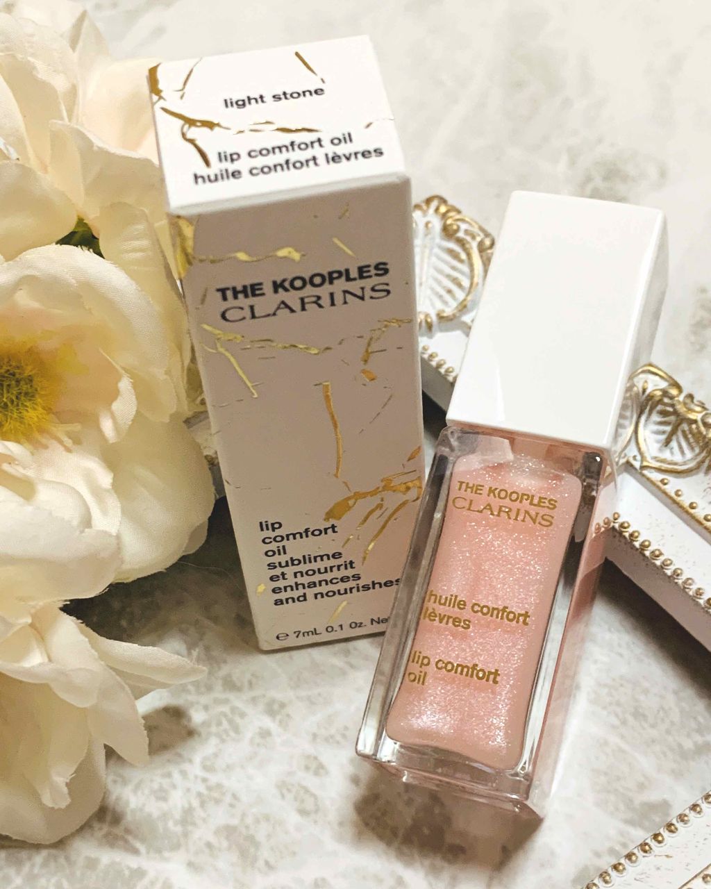 コンフォート リップオイル  ライトストーン(限定色)/CLARINS/リップグロスを使ったクチコミ（1枚目）