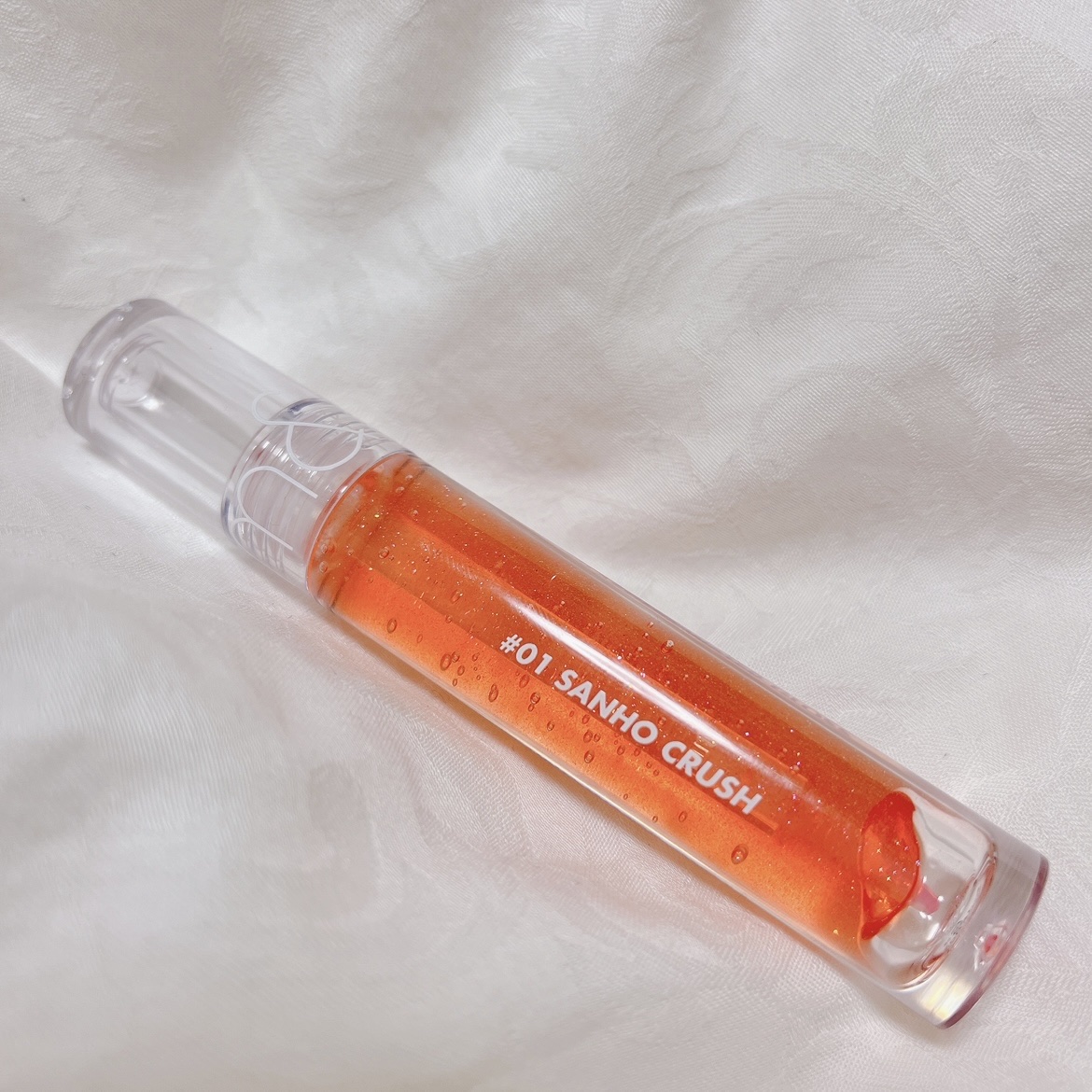 グラスティングウォーターグロス 01 サンゴ・クラッシュ/rom&nd/リップグロスを使ったクチコミ（2枚目）