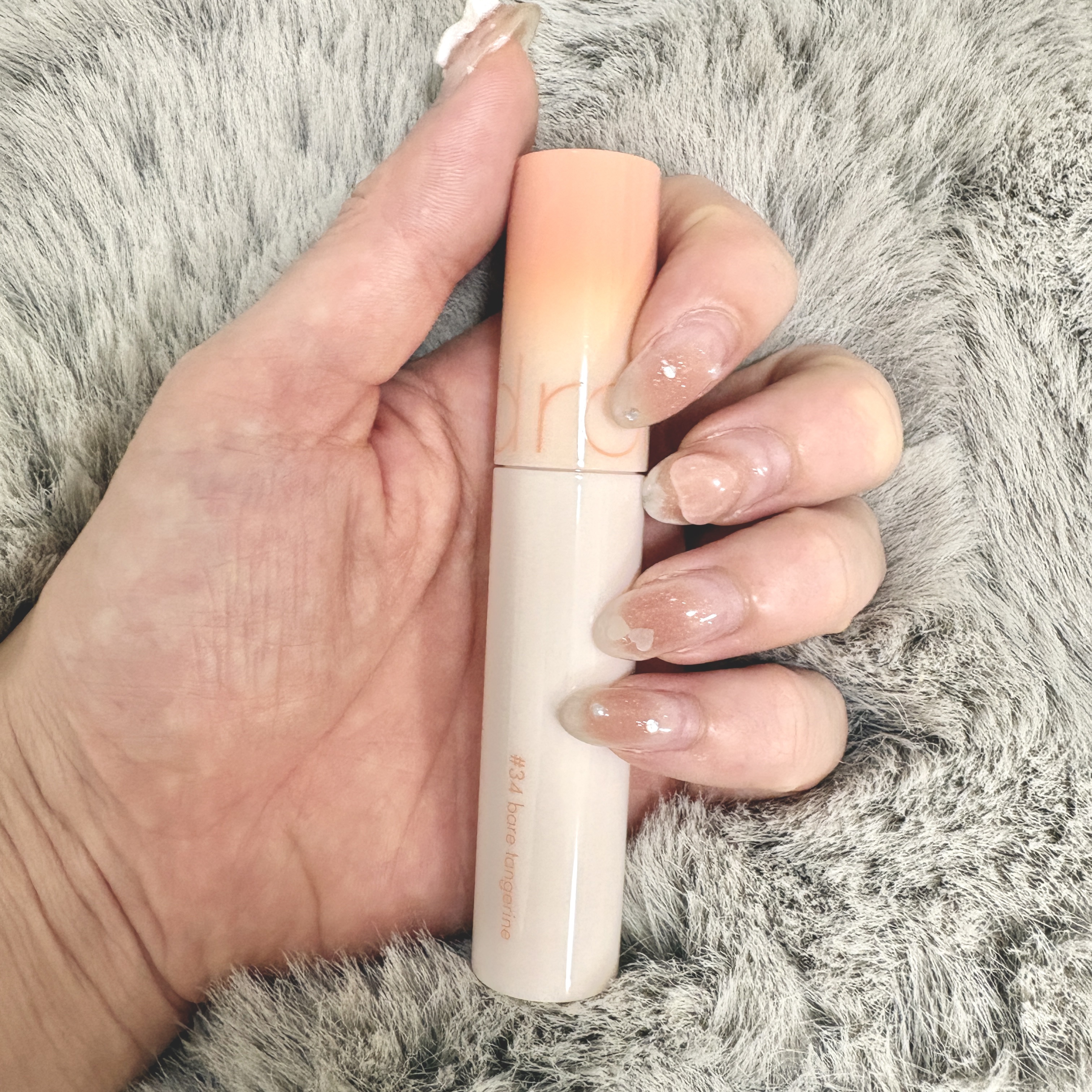 ジューシーラスティングティント 34 ベアタンジェリン(BARE TANGERINE)/rom&nd/リップティントを使ったクチコミ（1枚目）