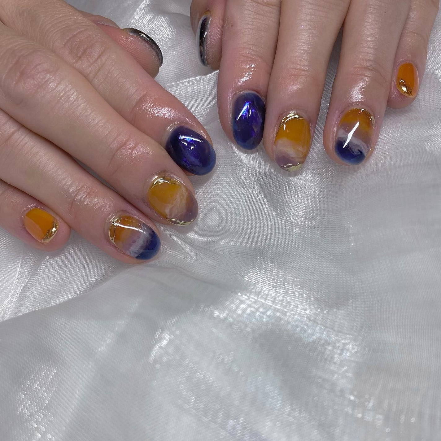 kanna on LIPS 「・・・夕焼けネイル🌇🧡💙ブルー多めで夜に近い夕焼け🥰✨・・・#..」(2枚目)