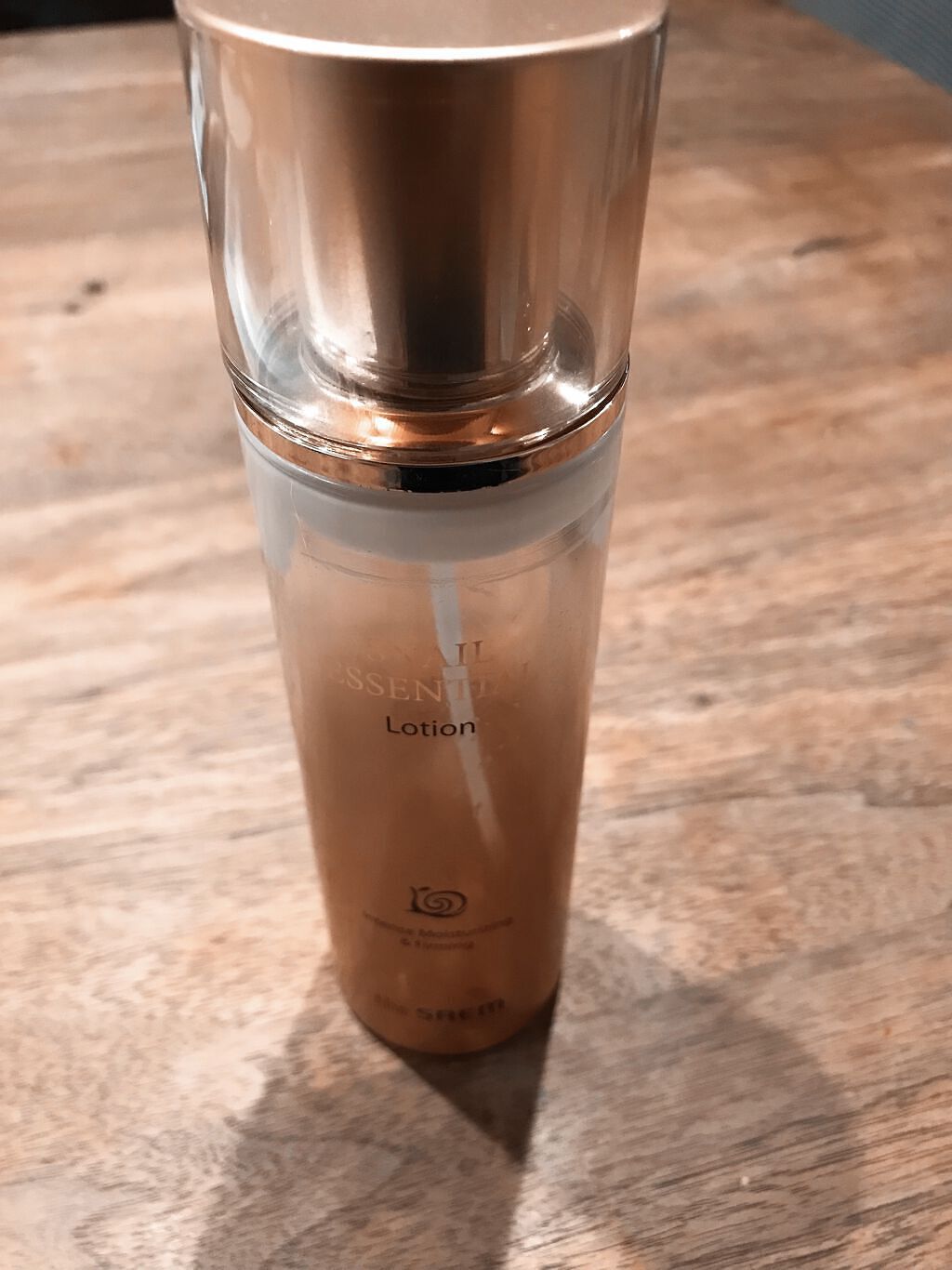 the SAEM SNAIL ESSENTIAL  Lotion