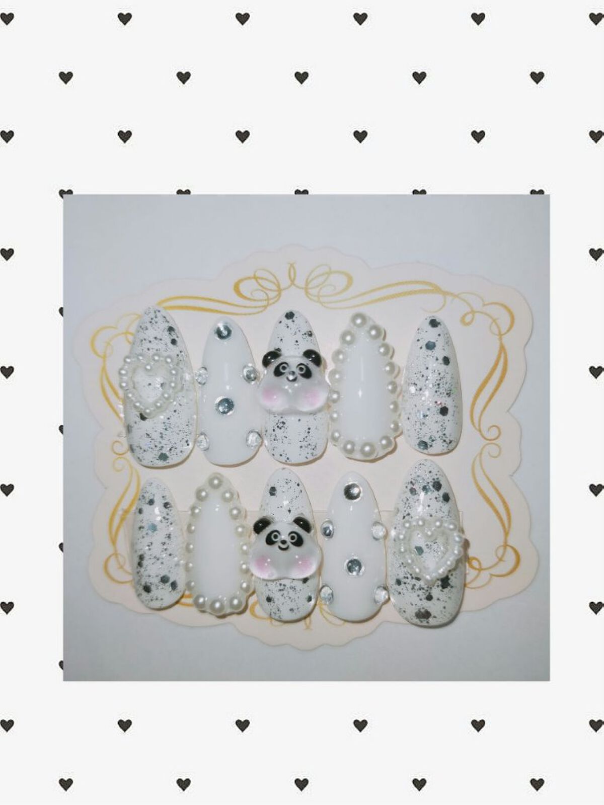 ｹﾂｱｺﾞ🐼のパーツが可愛いホワイトネイルチップ作りました(๑♡∀♡๑)

 
使用したもの

︎︎︎︎︎︎︎︎︎︎︎︎☑︎SHEINのパーツ

︎︎︎︎︎︎☑︎セリア、カラージェルネイル    WHITE

︎︎︎︎︎︎☑︎ダイソー、ト