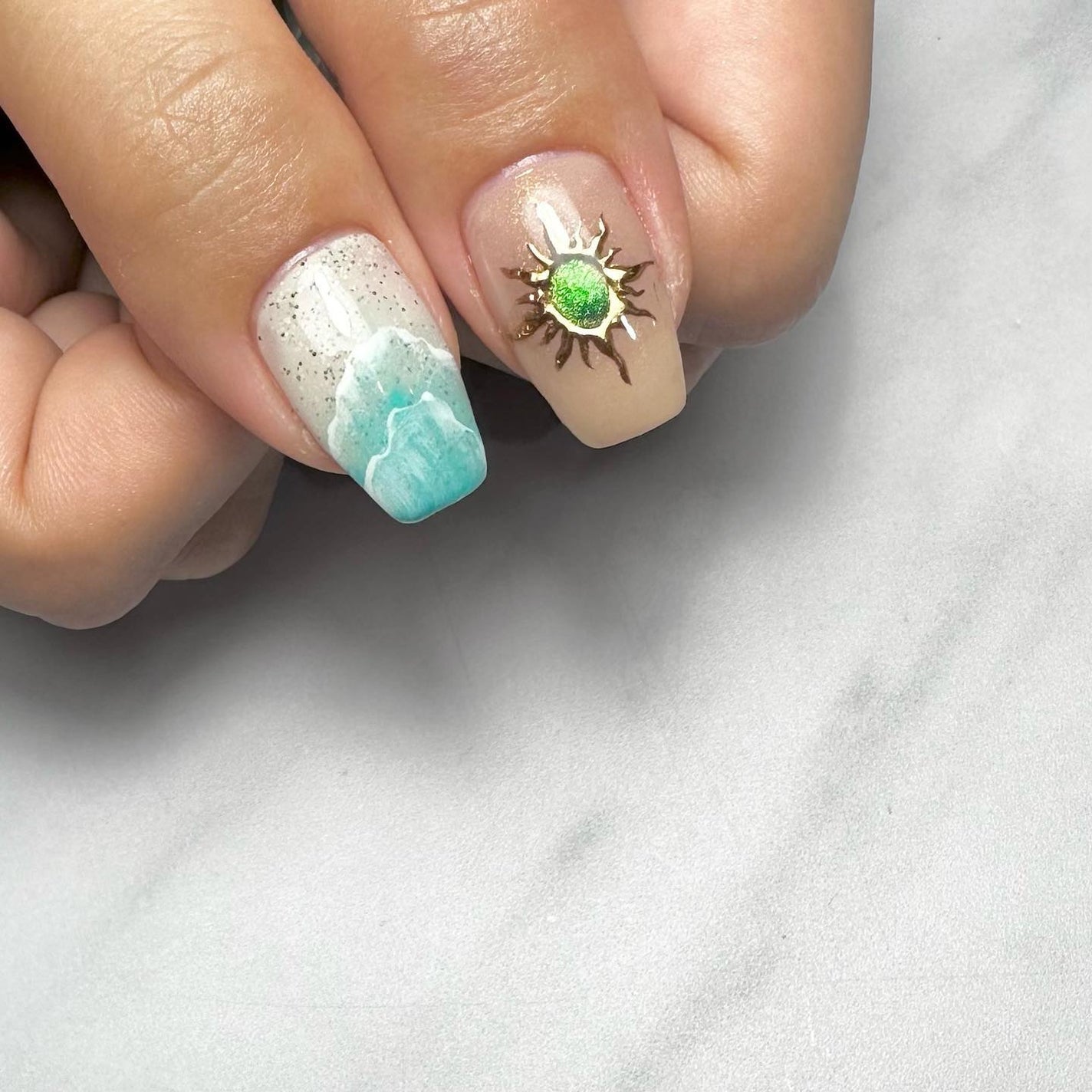 kanna on LIPS 「・・・𝕊𝕖𝕒𝕕𝕖𝕤𝕚𝕘𝕟🫧🐬🌞🩵海に行きたくなるネイル🫶🩷去年..」(3枚目)