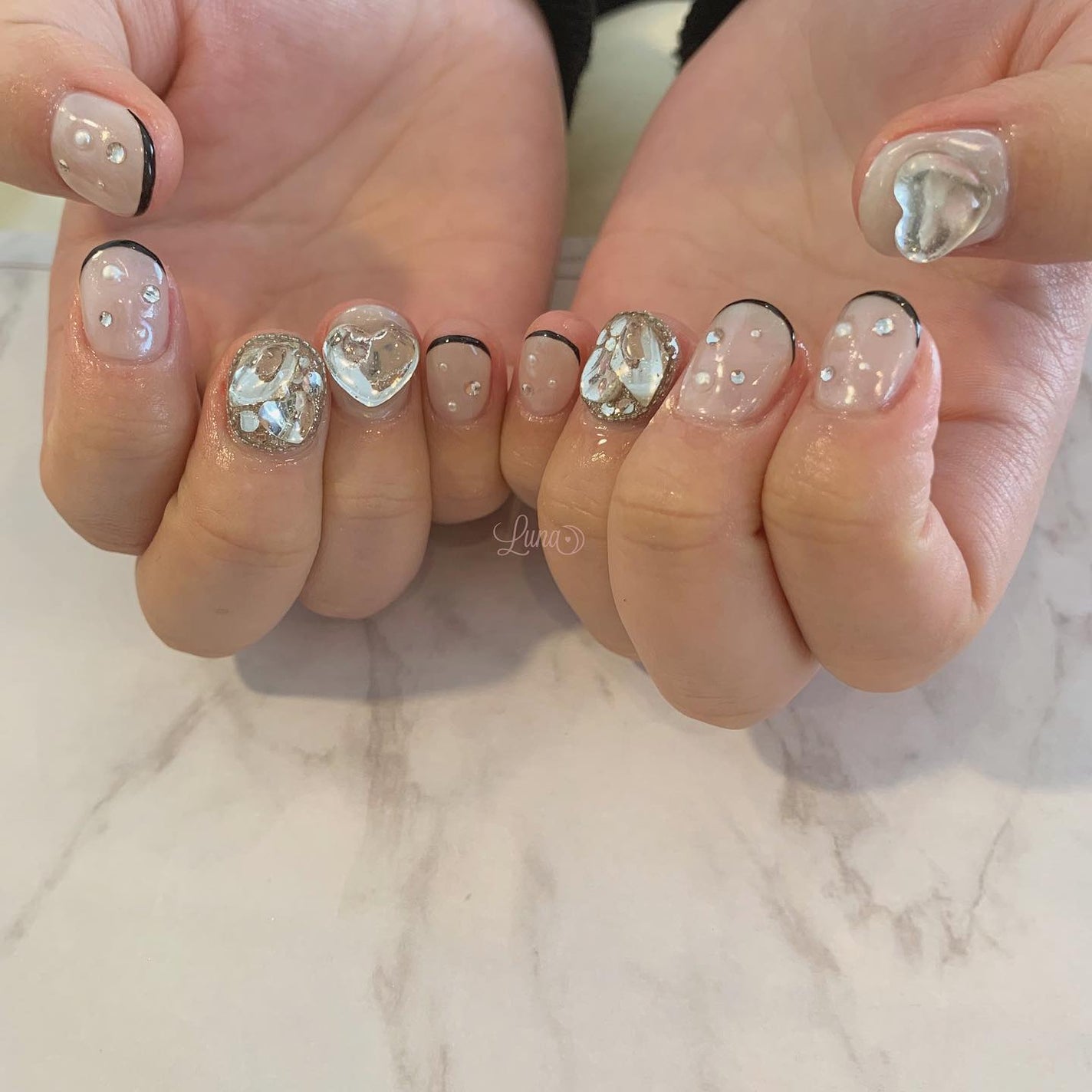 Iuna. Mizuki on LIPS 「.成人おめでとうございます🤍🏁#nail#nailstagra..」(2枚目)